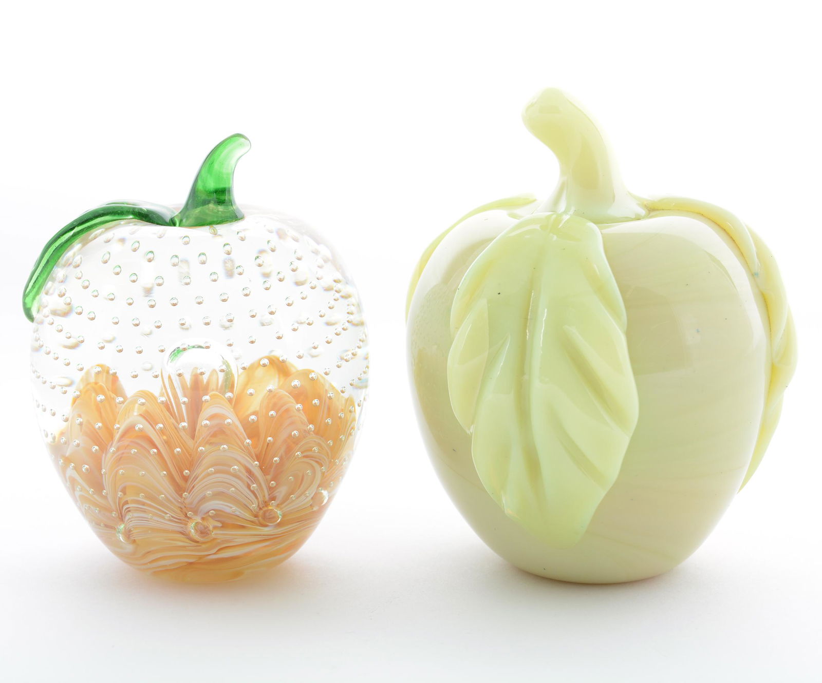 (2) Paperweights, Figural Fruit: (2) Paperweights, Figural Fruit, (1) 4.75" Height, Marked Gibson 1971, Custard Type Glass Apple with Three Leaves, Leaves Have Hard to See Fractures, (1) 4.25" Height, Marked Joe St. Clair, Clear with