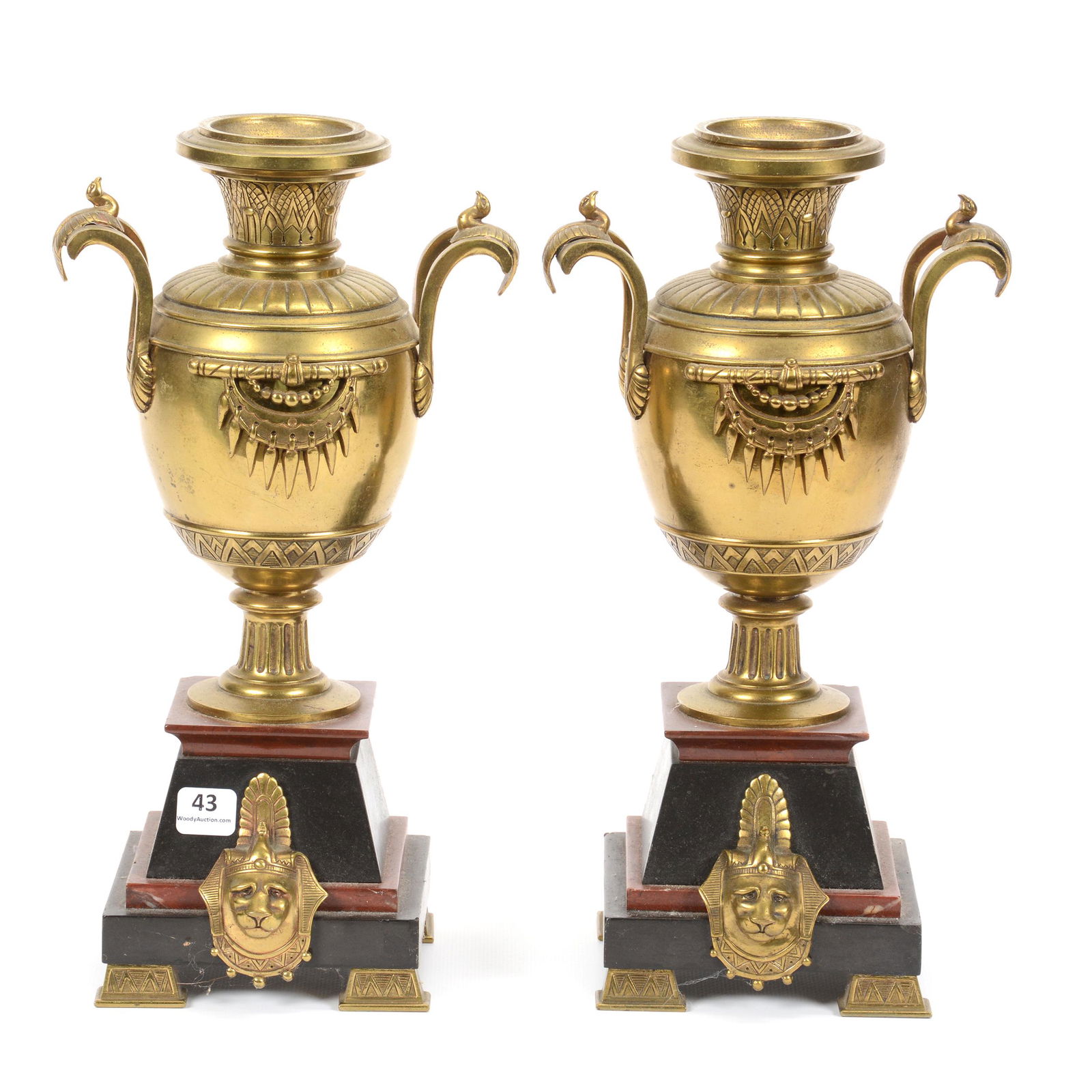 Pair Urns, Brass and Onyx: Pair Urns, Brass and Onyx, 13", Egyptian Style Motif, Brass Urn Set on Black and Brown Stone Base, Corner Chip on One Base; the Collection of Mrs. R. and the Late Dr. S. Alexander.