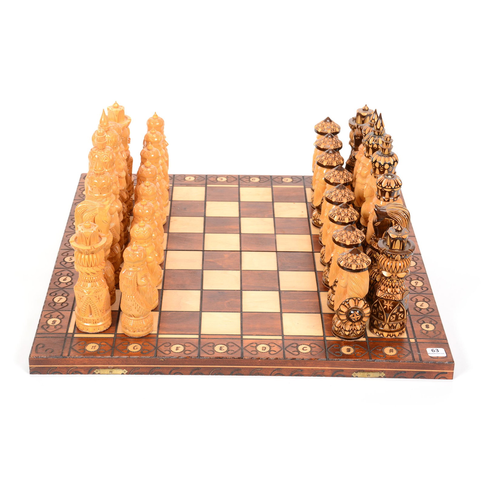 Chess Set, Carved Wood, With Board: Chess Set, Carved Wood, with Board, Complete Carved Figural Set, Sizes of Pieces Range from 8.25" to 5", One Bishop on Each Side is Missing Point on Hat, Black Knight's Horse has One Chipped Ear, One 