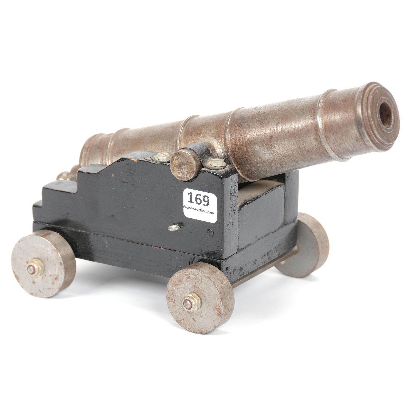Miniature Working Cannon, Solid Iron: Miniature Working Cannon, Solid Iron, 5.5" X 9", Ebony Wooden Base, Steel Wheels; the Collection of Mrs. R. and the Late Dr. S. Alexander.