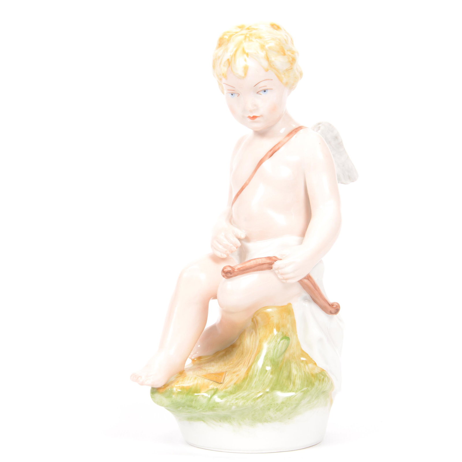 Royal Dux Figurine: Royal Dux Figurine, 8.5", Cherub Sitting While Holding Bow and Quiver; the Collection of Mrs. R. and the Late Dr. S. Alexander.