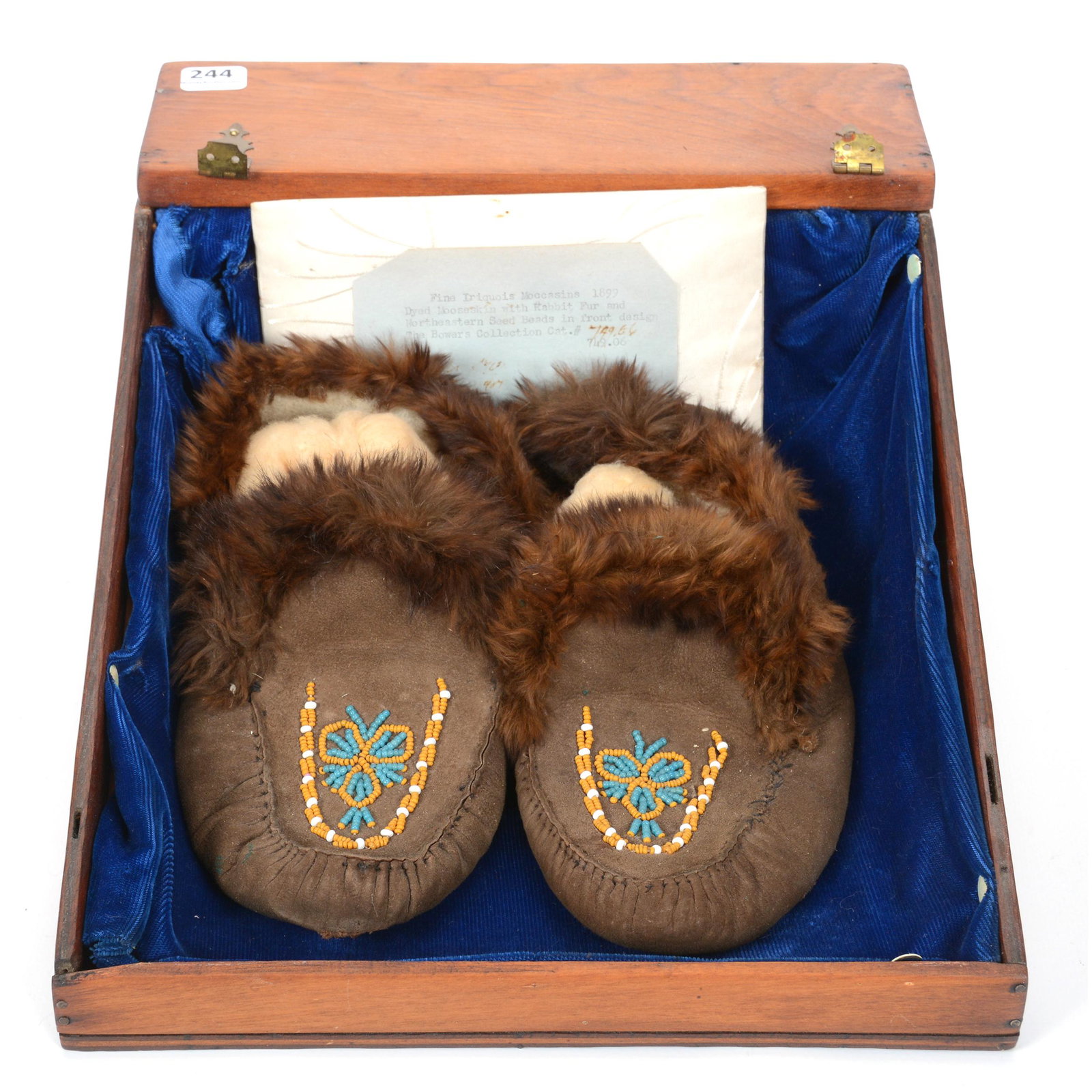 Display Case with Indian Moccasins: Display Case with Indian Moccasins, Iroquois Moose Skin & Rabbit Fur, Beaded with Turquoise, White and Brown Beads, Leather is Very Supple, Circa 1900's, Moccasins are Approximately 9" Length, Wooden 