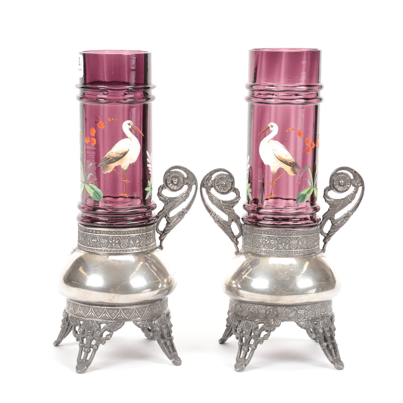 Pair Victorian Cylinder Vases on Silverplate Stands: Pair Victorian Cylinder Vases on Silverplate Stands, 9.75", Amethyst with Enamel Stork Decor, One Silverplate Stand is Missing One Handle; the Collection of Mrs. R. and the Late Dr. S. Alexander.