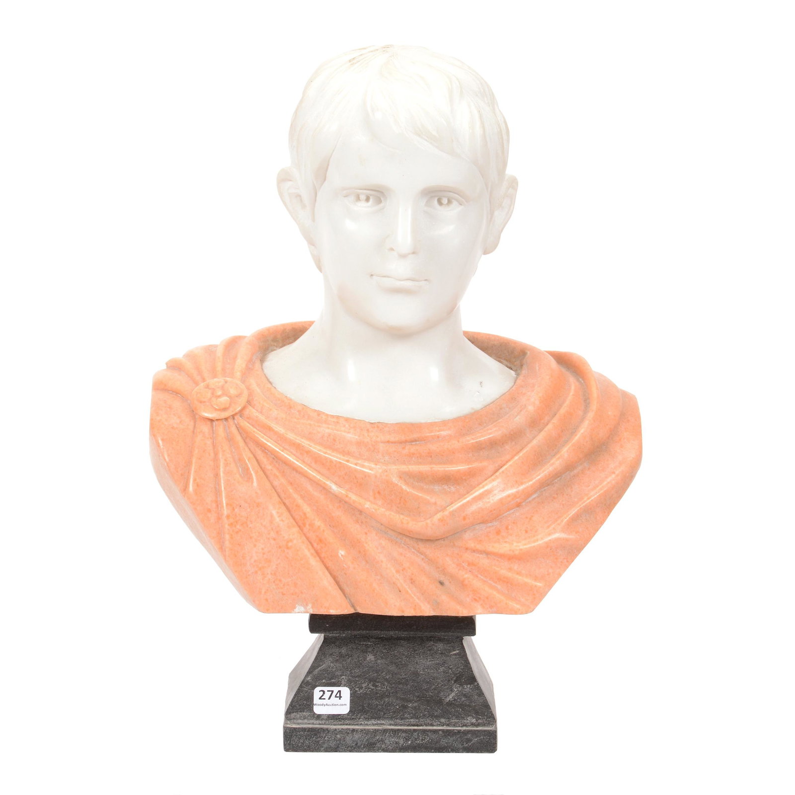 Carved Marble Bust, Young Man Wearing Cloak: Carved Marble Bust, Young Man Wearing Cloak, 17" X 12", Square Black Base, Post-1970, Total Weight of over 50 Pounds, Chip on Cloak; the Collection of Mrs. R. and the Late Dr. S. Alexander.