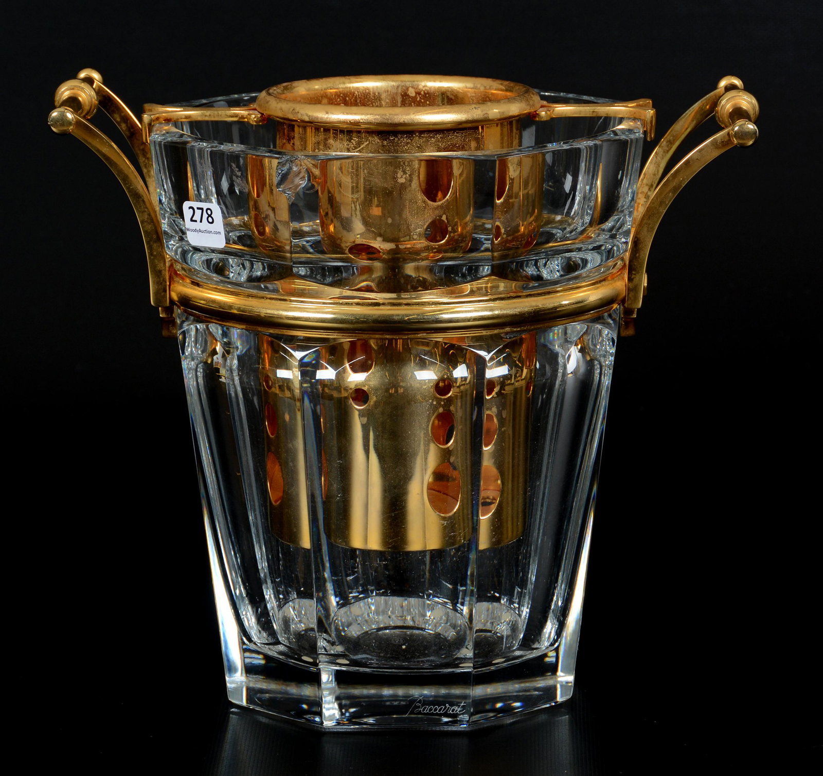 Champagne Cooler Marked Baccarat: Champagne Cooler Marked Baccarat, 9.5" X 11.75", Eight-Sided Crystal Body with Gilt Metal Handles and Original Gilt Metal Bottle Holder Insert, Thumbnail Size Chip on Rim Ridge; the Collection of Mrs.