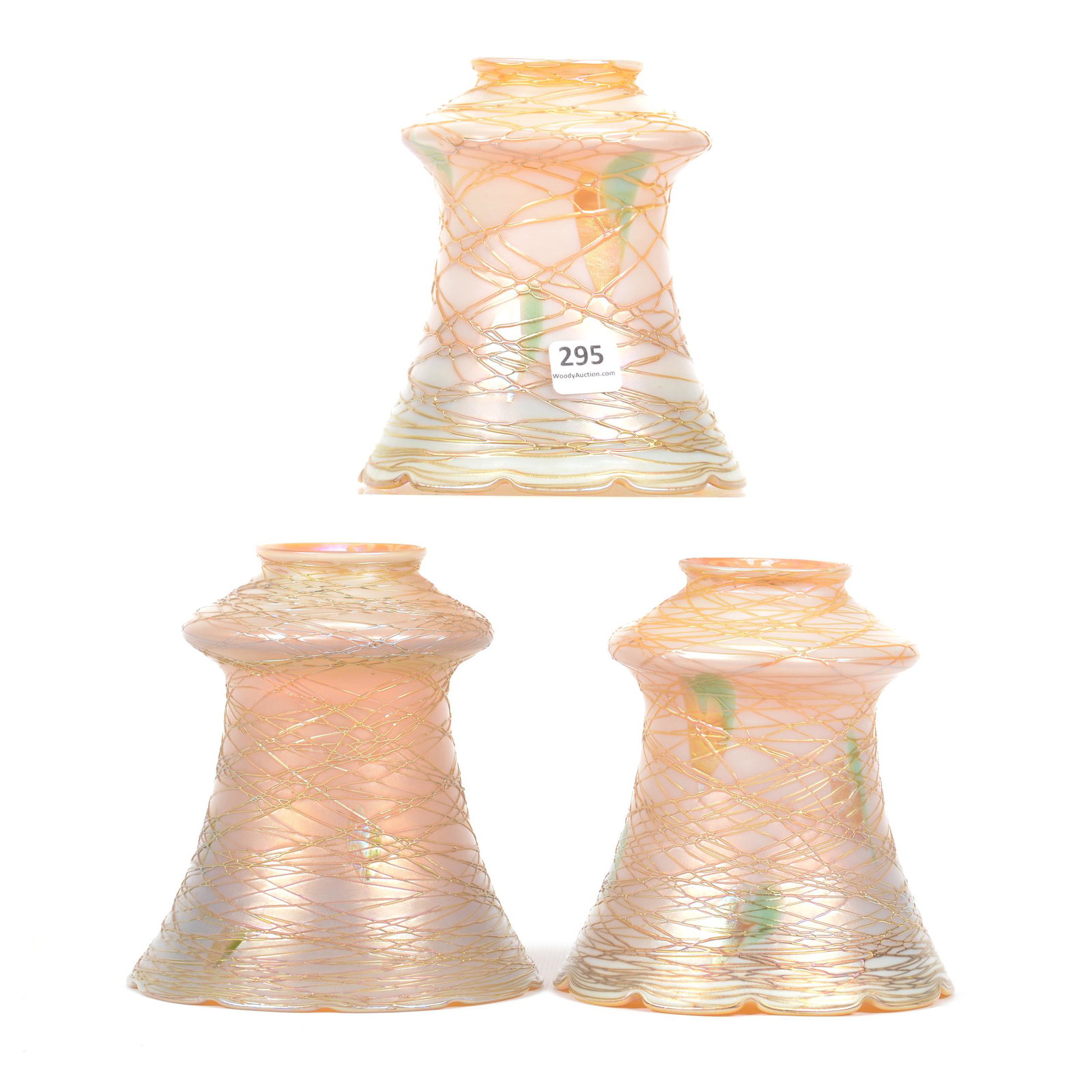 (3) Signed Quetzal Art Glass Shades: (3) Signed Quetzal Art Glass Shades, 5.25" X 5", Heart and Vine Threaded Decor, Gold Interior, 2.25" Fitter Opening; the Collection of Mrs. R. and the Late Dr. S. Alexander.