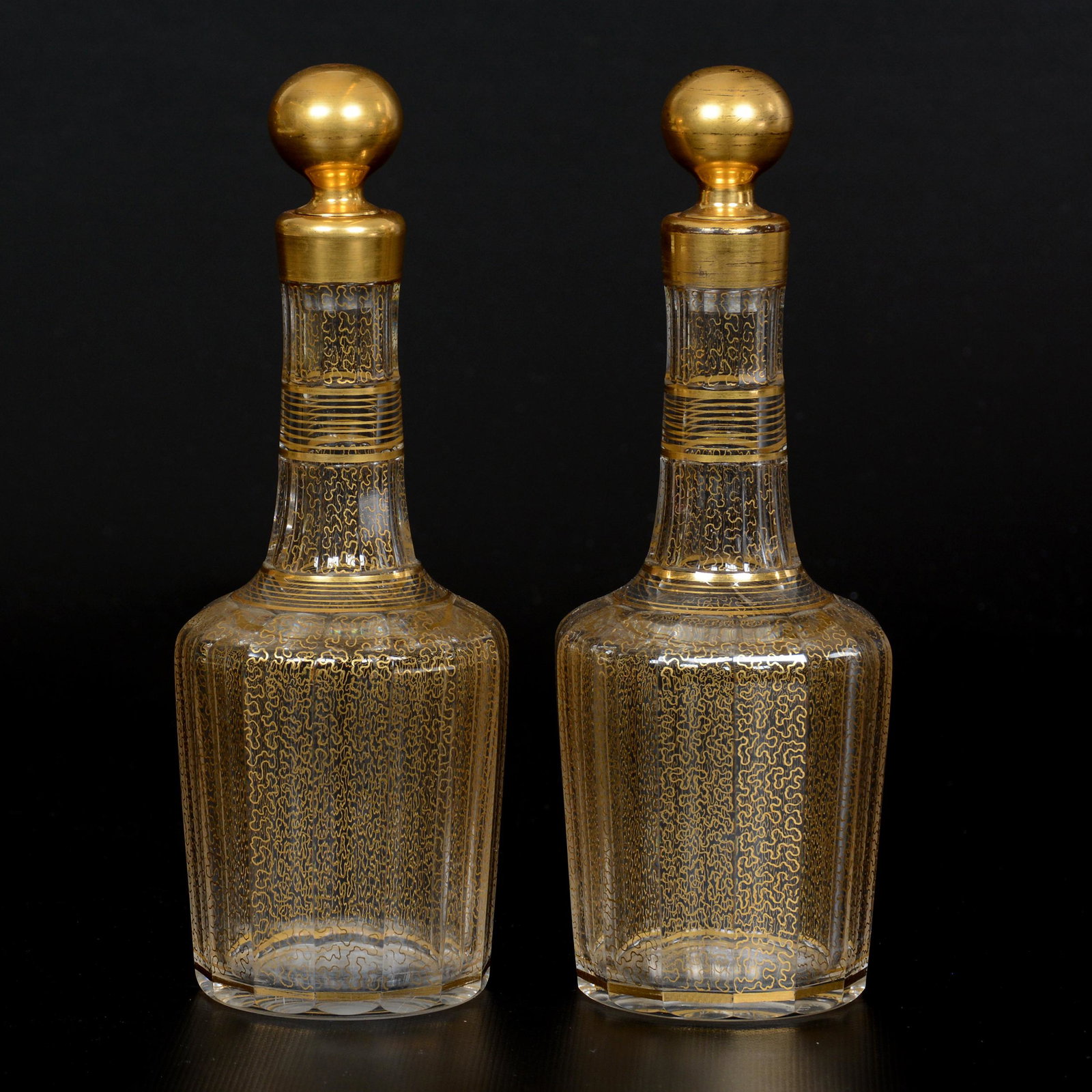 Pair Baccarat Glass Decanters: Pair Baccarat Glass Decanters, 8.75", Extensive Gold Highlights, Fitted Stoppers; the Collection of Mrs. R. and the Late Dr. S. Alexander. UPDATED 7-20-20: Attributed to Baccarat