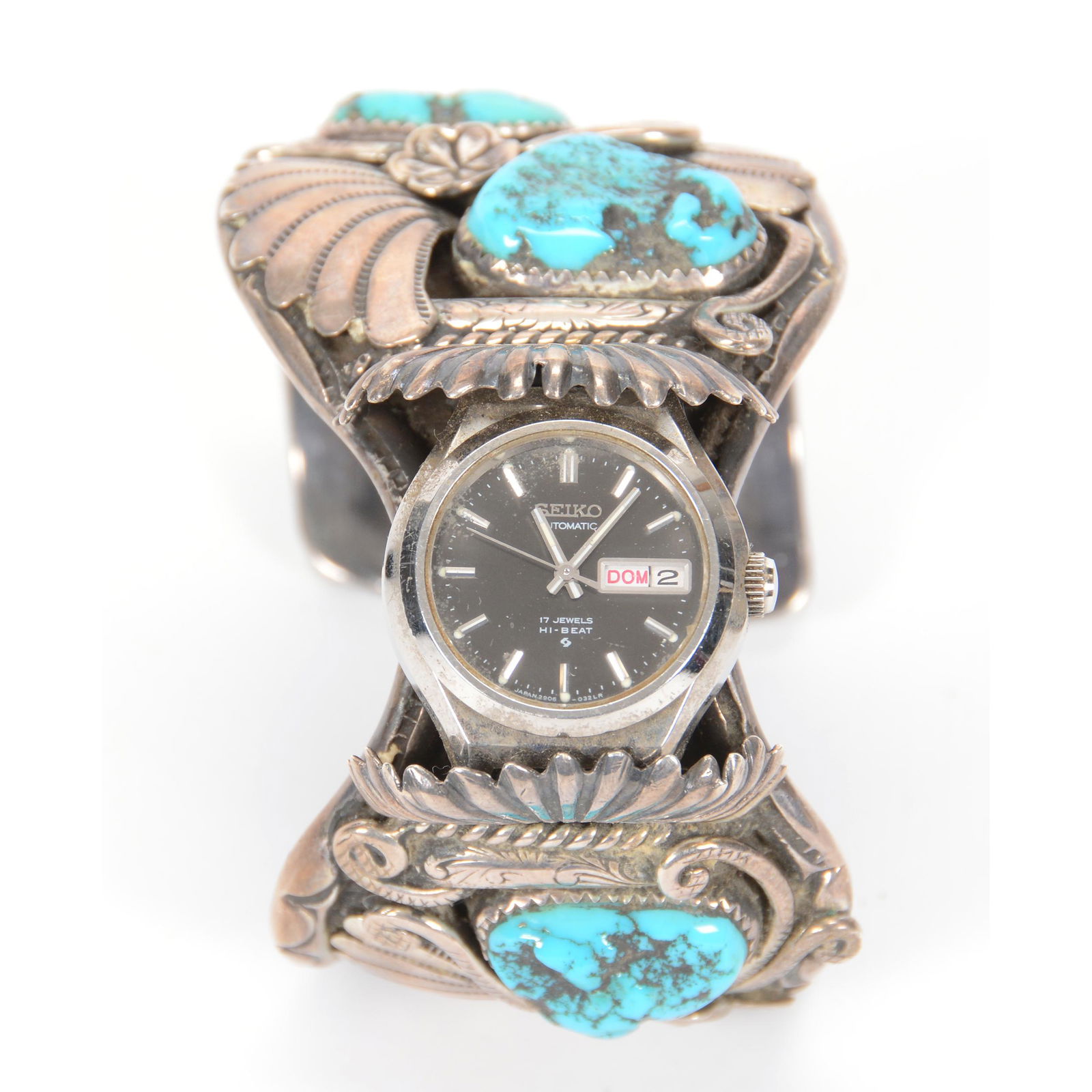 Original Vintage Silver/Turquoise Navajo Wristwatch: Original Vintage Silver/Turquoise Navajo Wristwatch, Seiko Dial, Four Turquoise Stones with Elaborate Silver Work, Signed "J.V.B." (Jimmy Victor Begay); the Collection of Mrs. R. and the Late Dr. S. A