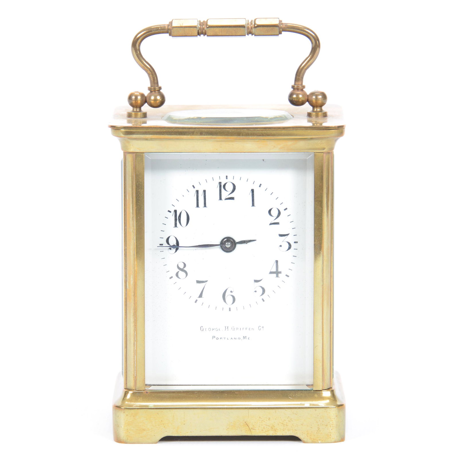 Carriage Clock, "George H. Griffen, Portland Maine": Carriage Clock, "George H. Griffen, Portland, Maine", 4.5" X 3.25", Works Made in France, Beveled Glass, Brass Frame, No Key; the Collection of Mrs. R. and the Late Dr. S. Alexander.