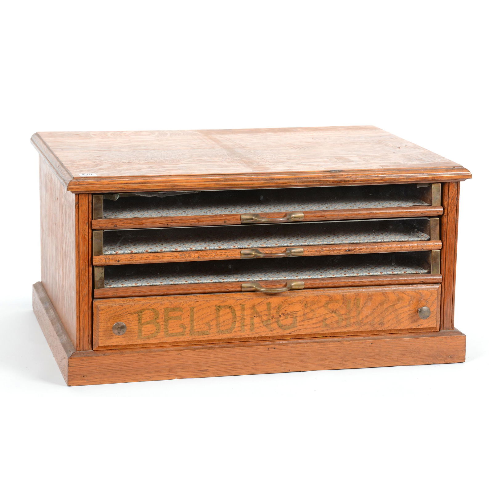 Oak Ribbon Advertising Cabinet "Belding: Oak Ribbon Advertising Cabinet "Belding's Silk", 11" X 22.5" X 16", (3) Glass Front Drawers, (1) Oak Front Drawer, Original Paper Label on Back of Cabinet; the Collection of Mrs. R. and the Late Dr. S