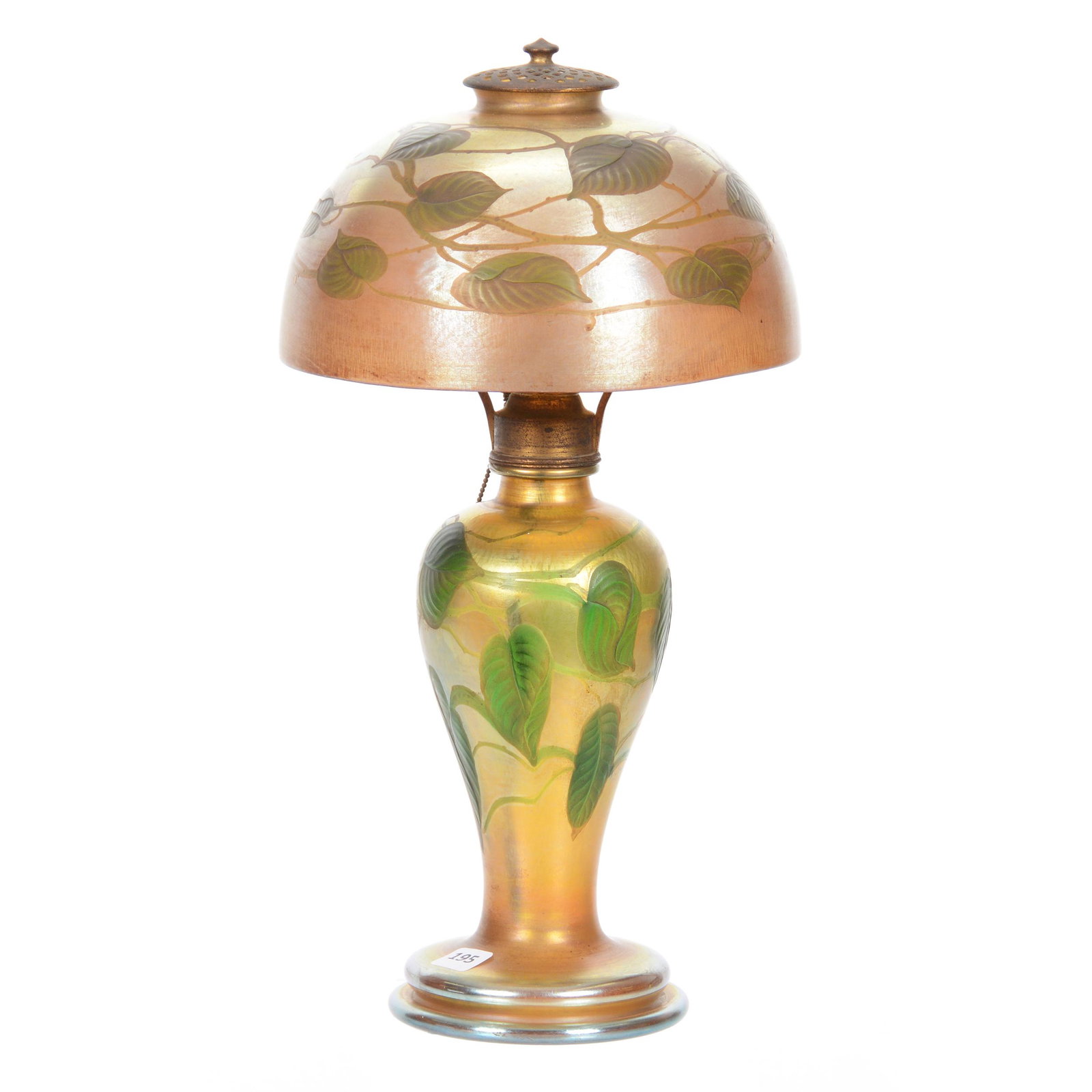Lamp, Signed "L.C. Tiffany-Favrile": Lamp, Signed "L.C. Tiffany-Favrile", 15" x 8", Gold Iridescence with Carved Green Heart and Vine Design, Shade Also Signed "L.C. Tiffany-Favrile 4405K", Shade has Early Three Staple Repair, Very Rare 