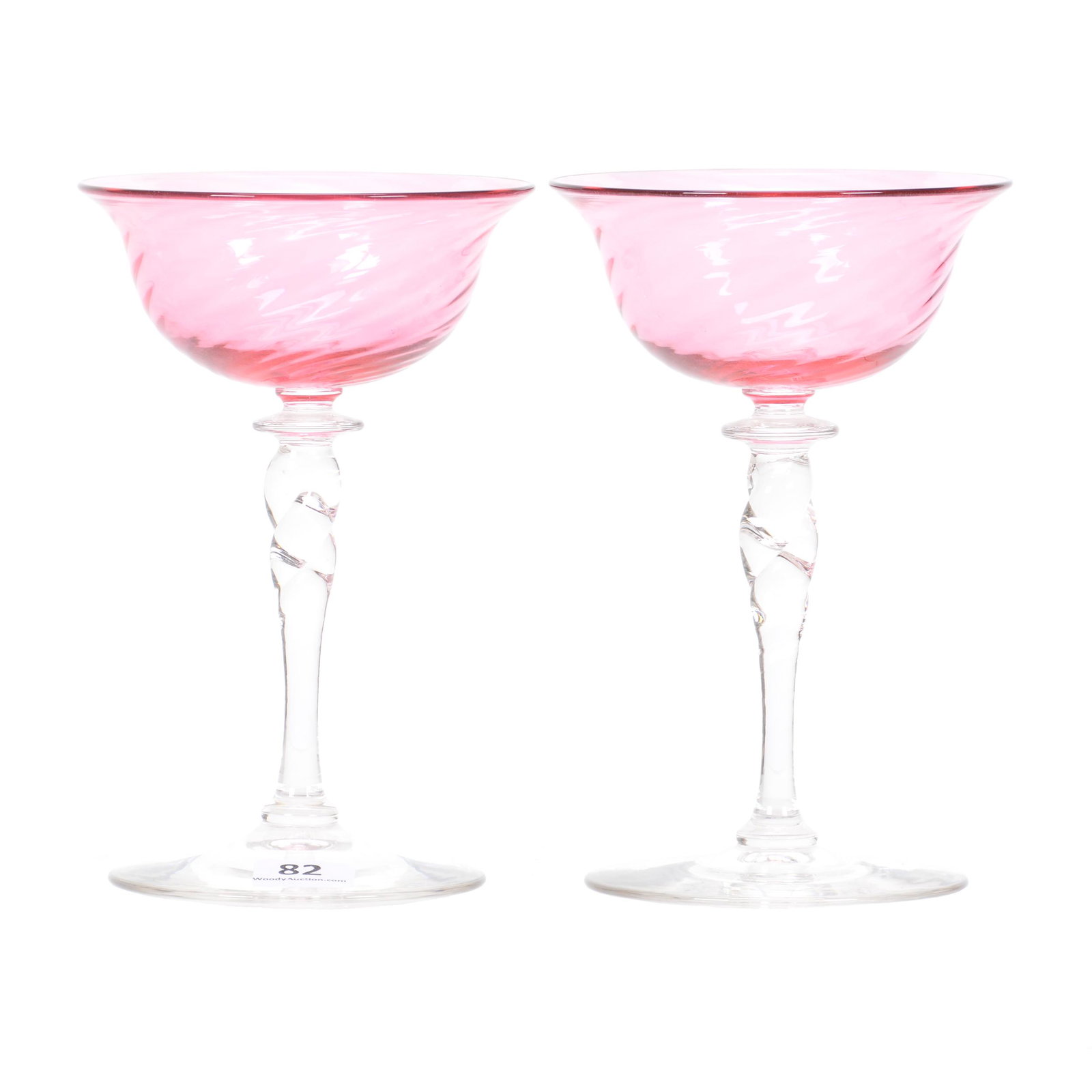 (2) Champagne Stems by Steuben, Gold Ruby Color: (2) Champagne Stems by Steuben, Gold Ruby Color, 6.25" x 4", Bowls are Spiral Ribbed with Clear Twist Stem and Foot, The Estate of Les Hamilton