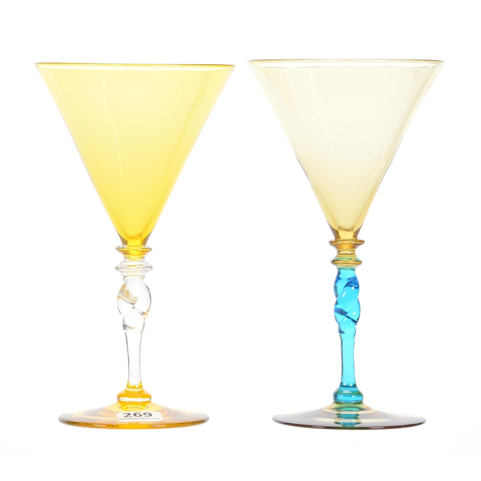 Pair Stems by Steuben,: Pair Stems by Steuben, 7" x 3.875", (1) Bristol Yellow with Clear Twist Stem, (1) Amber with Blue Twist Stem, The Estate of Les Hamilton
