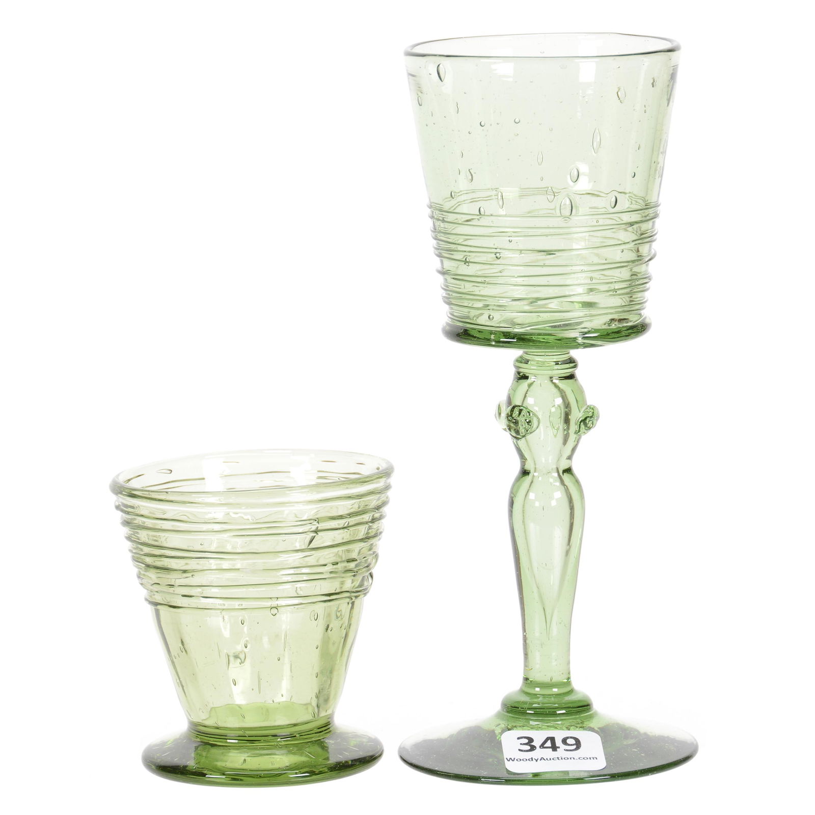 (2) Items by Steuben, Spanish Green Art Glass: (2) Items by Steuben, Spanish Green Art Glass, Controlled Bubble with Threaded Design Highlights, (1) 6.25" Wine, (1) 2.75" Shot Glass, The Estate of Les Hamilton