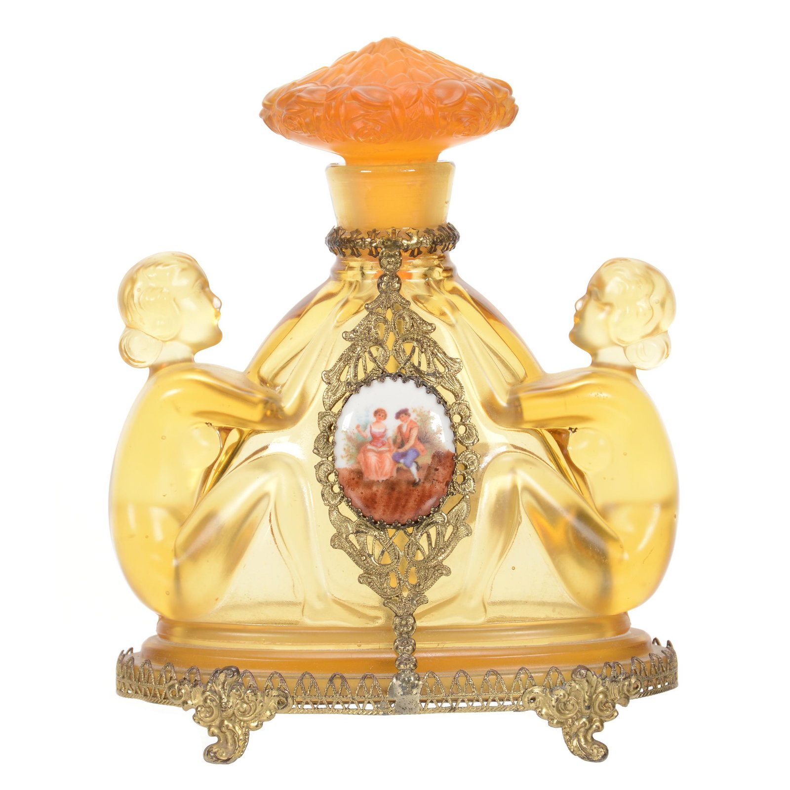 Figural Perfume, Unmarked Czechoslovakia: Figural Perfume, Unmarked Czechoslovakia, 5.75" x 4.75", Amber with Figure of Two Nudes, Original Stopper, Gilt Metal Fittings with Porcelain Medallion Inset, John Lolley Estate, Monroe, LA. The major