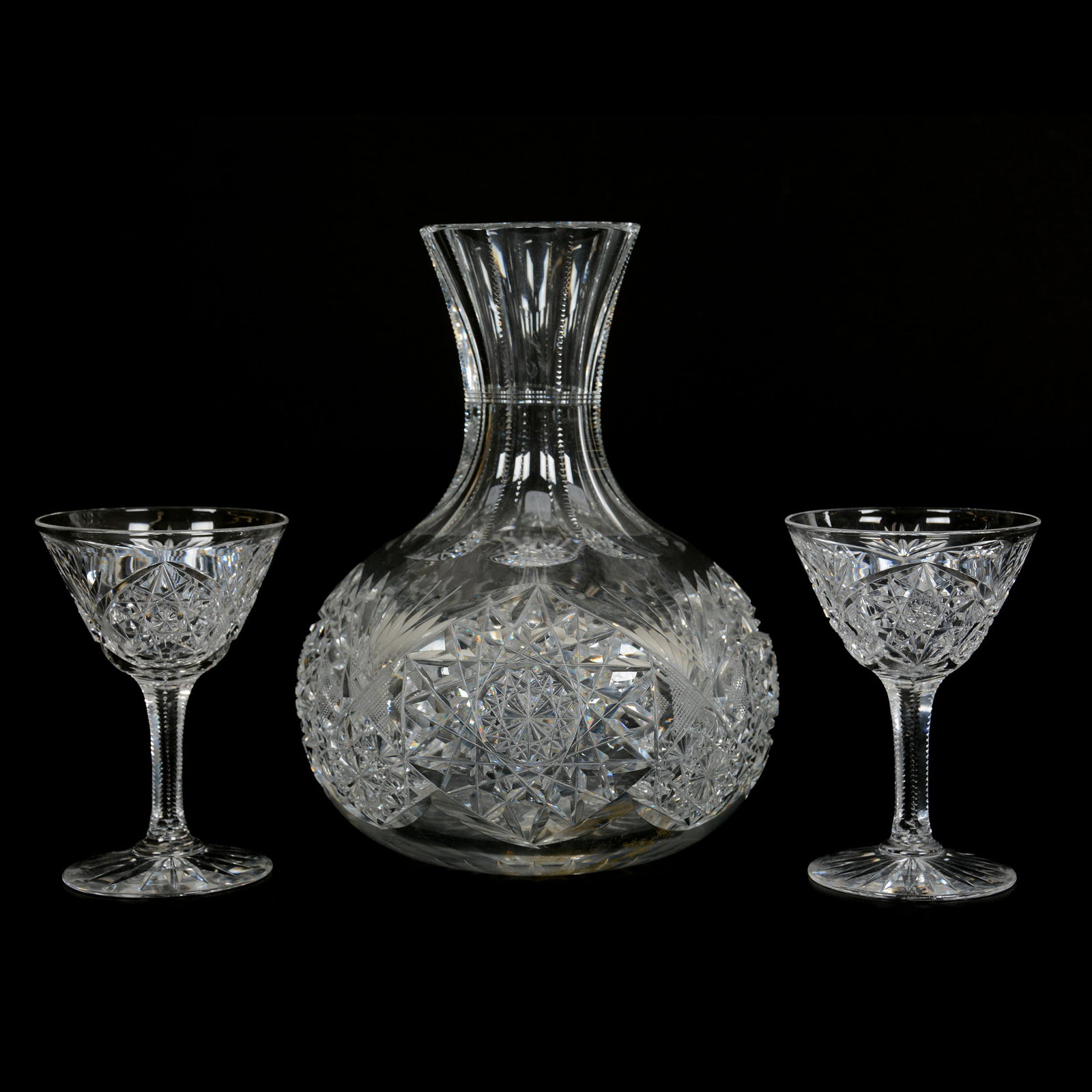 Carafe & (2) Stems, ABCG, Stems Signed Tuthill: Carafe & (2) Stems, American Brilliant Cut Glass, Stems Signed Tuthill, 8.25" x 6.25", All in Same Pattern, Hobstar, Strawberry Diamond and Fan Motif, Ray Cut Base, From a Pacific Northwest Cut Glass 