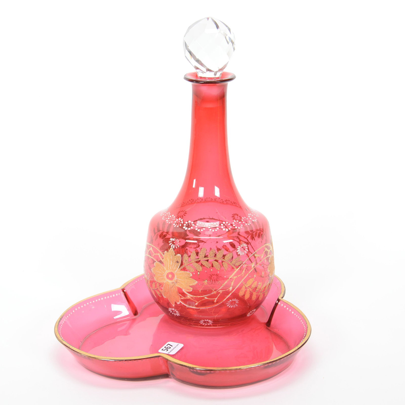(2) Cranberry Art Glass Items: (2) Cranberry Art Glass Items, (1) 11.5" X 5" Decanter, Gold Coralene Floral Decor With White Enamel Highlights, (1) 1.25" X 9.5" Clover Shaped Tray, White Enamel Beaded Highlights, Private Collection