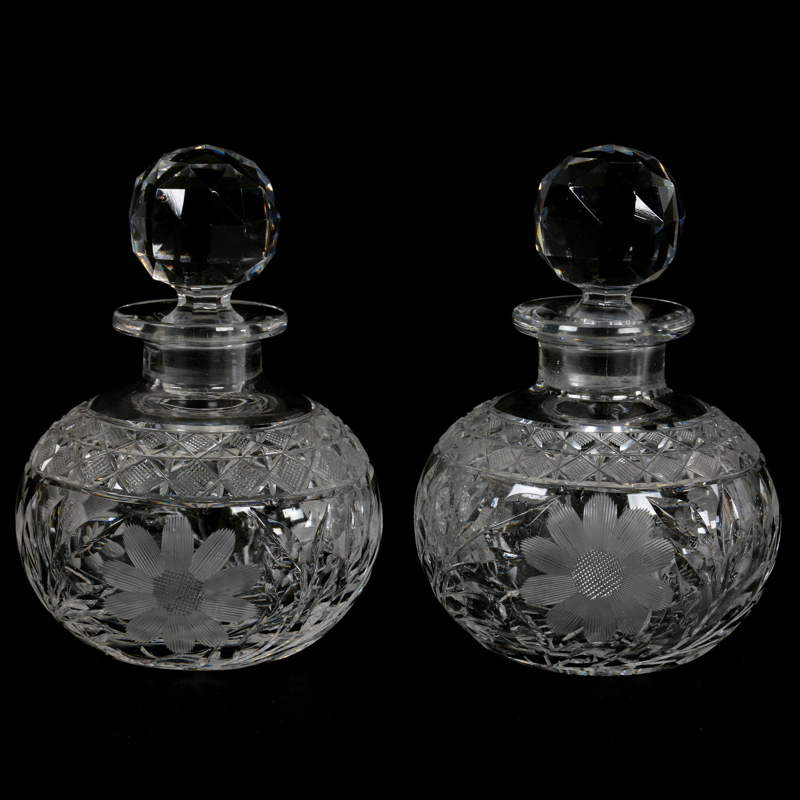 (2) Cologne Bottles, American Brilliant Cut Glass: (2) Cologne Bottles, American Brilliant Cut Glass, 6.5" x 4.25", Engraved Daisy Pattern With Diamond Cut Border, Ray Cut Base, Private Estate Collection, TX