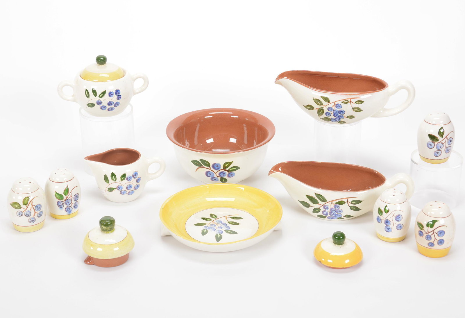 (11) Stangl Pottery Items, Blueberry Pattern: (11) Stangl Pottery Items, Blueberry Pattern, (2) 9" Gravy Boats, Both Have Interior Firing Cracks, (5) Salt & Pepper Shakers, (1) 7" Bowl, (1) 7.25" Casserole Lid, (1) Creamer And Covered Sugar Set, 