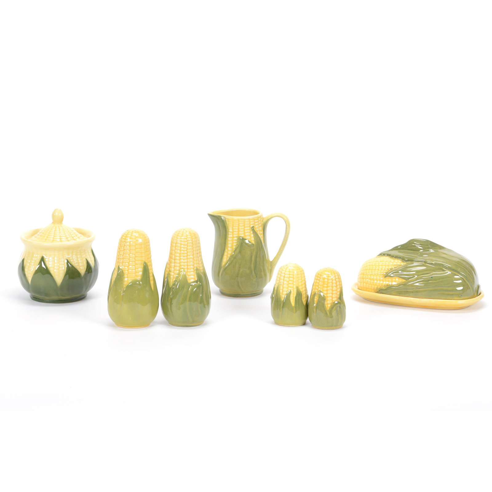 (7) Assorted Items, Shawnee Pottery Corn King: (7) Assorted Items, Shawnee Pottery Corn King, (1) 5.25" Salt/Pepper, (1) Creamer #70 & Covered Sugar #78, (1) 3.5" x 7" Butterdish #72, (1) 3.25" Salt/Pepper, Private Estate Collection, TX