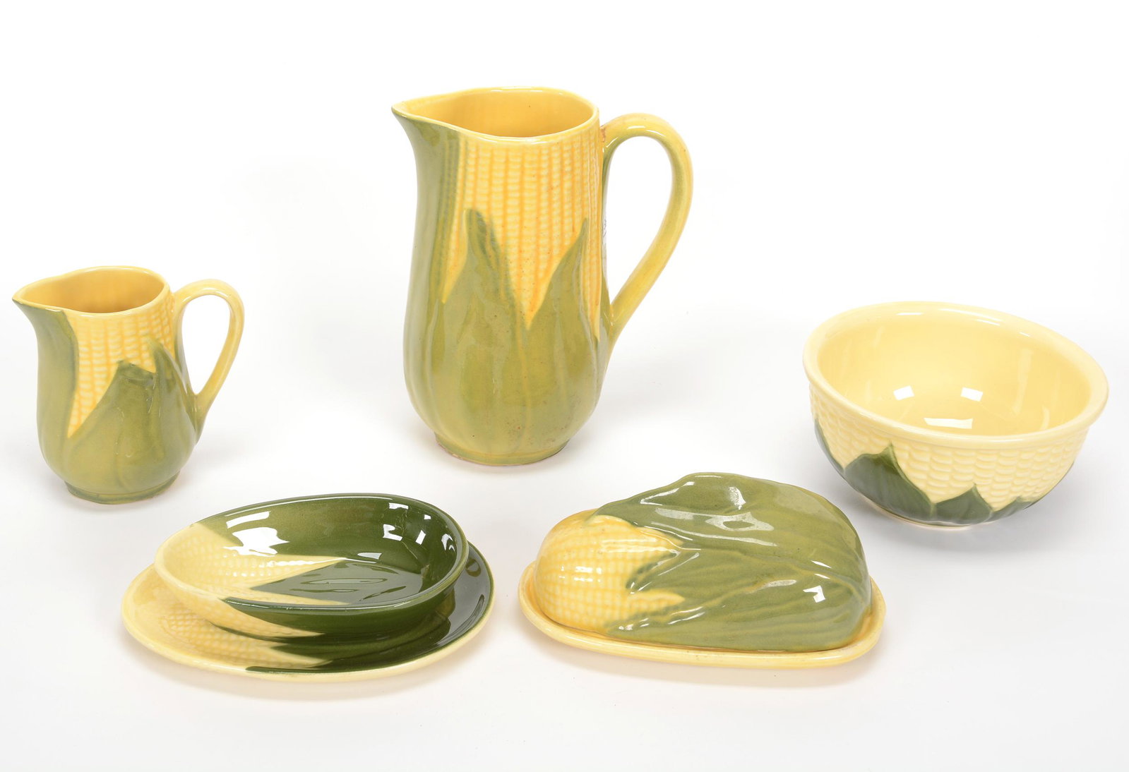 (6) Assorted Items, Shawnee Pottery Corn Queen: (6) Assorted Items, Shawnee Pottery Corn Queen, (1) 8.25" Pitcher, #71, (1) 4.75" Creamer, #70, (1) 3.25" x 6.5" Bowl, #6, (1) 3.5" x 7.5" Butterdish, #72, (1) 7.25" x 5.5" Tray, #93, (1) 1.5" x 6" Bo
