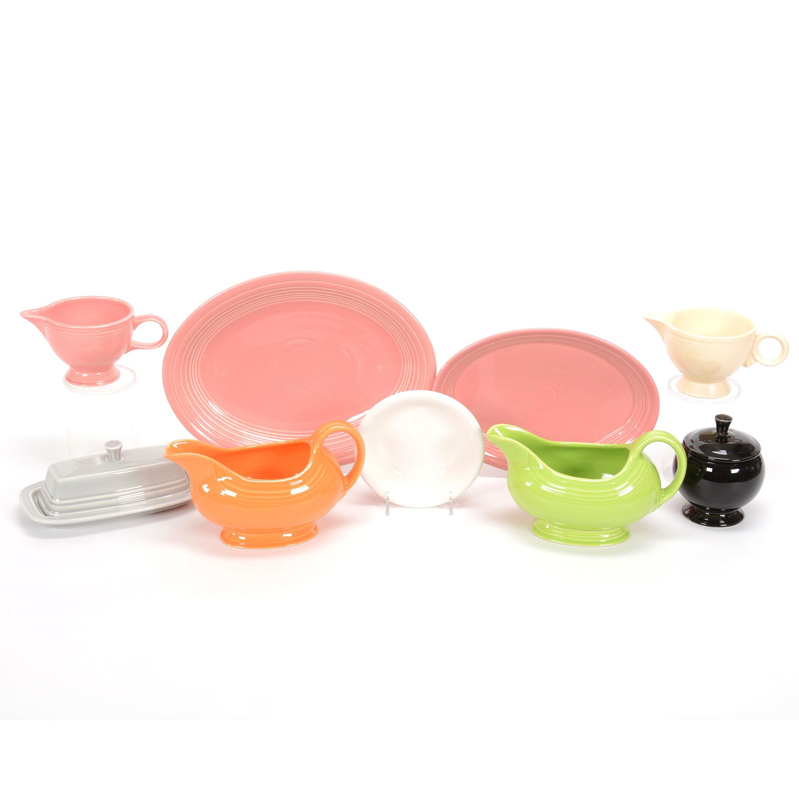 (9) Post-1986 Fiestaware Items: (9) Post-1986 Fiestaware Items, (1) 11.5" Oval Tray, (1) 9.5" Oval Tray, (2) 7.75" Gravy Boats, (1) 5.25" Berry Dish, (1) 7.25" Coverer Butterdish, (2) 3" Creamers, (1) 4.25" Covered Sugar, Private Co