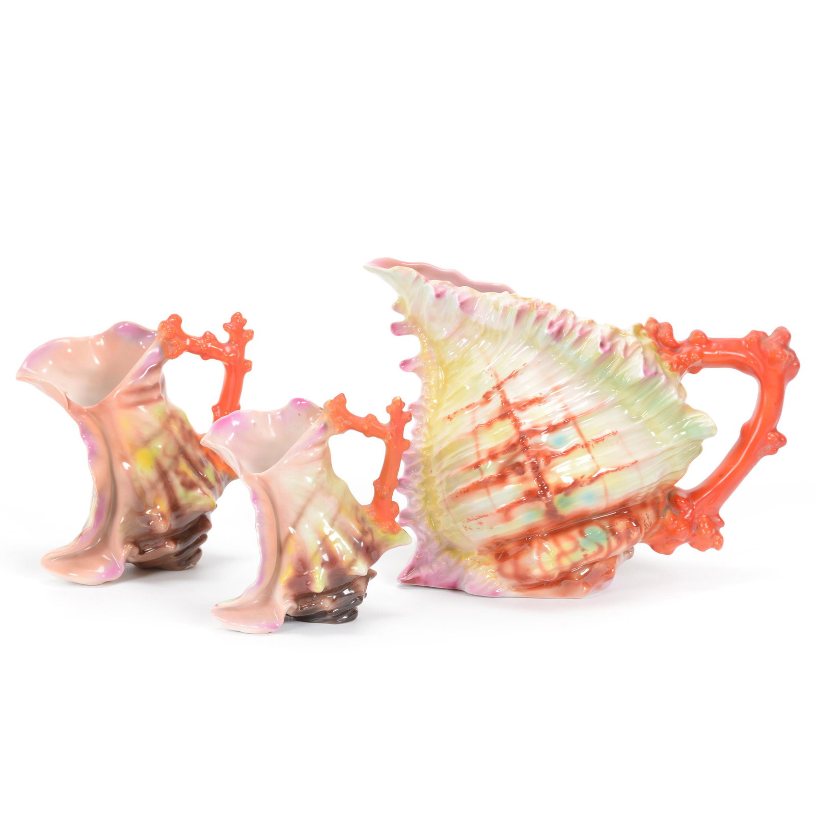 (3) Pitchers Unmarked Royal Bayreuth Shell With Coral: (3) Pitchers Unmarked Royal Bayreuth Shell With Coral, Rainbow Of Colors With Coral Handle, (1) 6.25" Water Pitcher, (1) 5.25" Milk Pitcher, Boot Shape, (1) 4.5" Creamer, Boot Shape, Private Midwest C