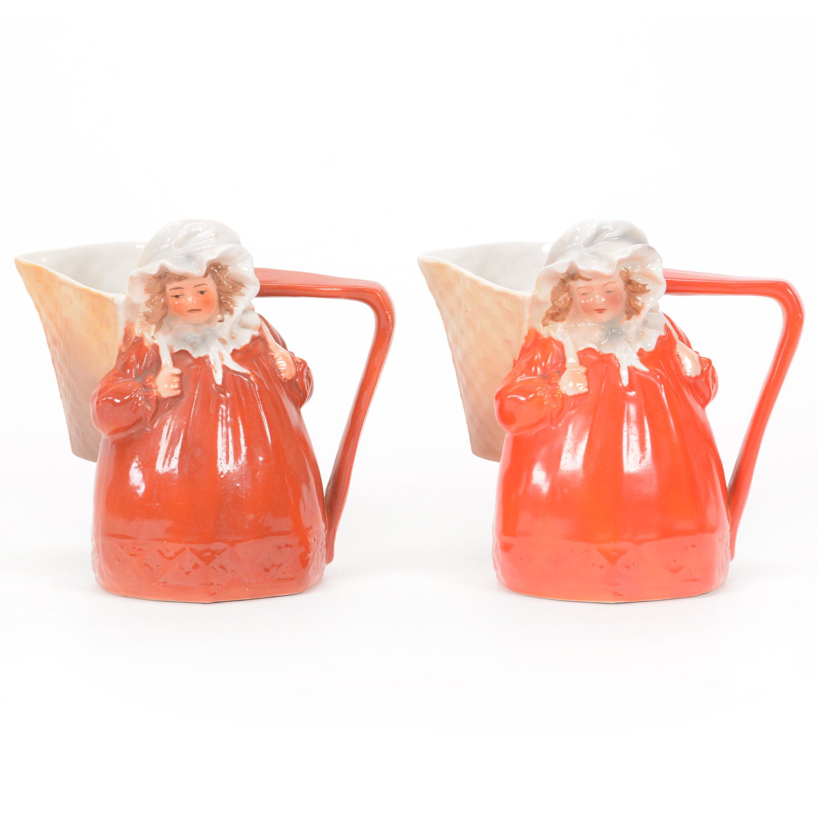 (2) Creamers Marked Royal Bayreuth Milk Maid: (2) Creamers Marked Royal Bayreuth Milk Maid, 4.25", Blue Mark, Milk Maid Holding Basket, (1) Red Dress, (1) Brown/Red Dress, Private Midwest Collection