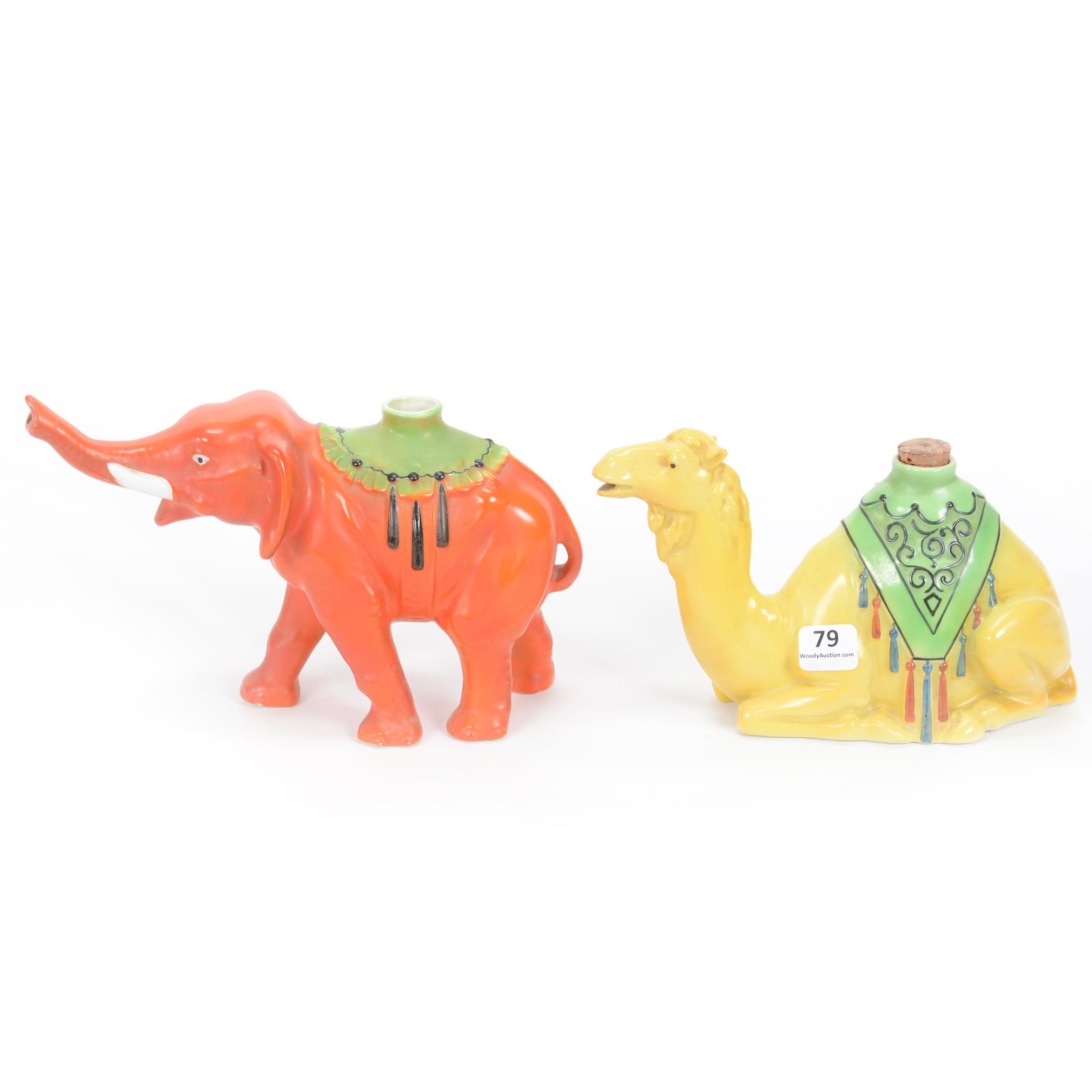 (2) Porcelain Figural Animal Decanters: (2) Porcelain Figural Animal Decanters, (1) 5.25" X 8.5" Red Elephant, No Stopper, (1) 4.75" X 8.5" Kneeling Camel, Yellow, Cork Stopper Only, Private Midwest Collection