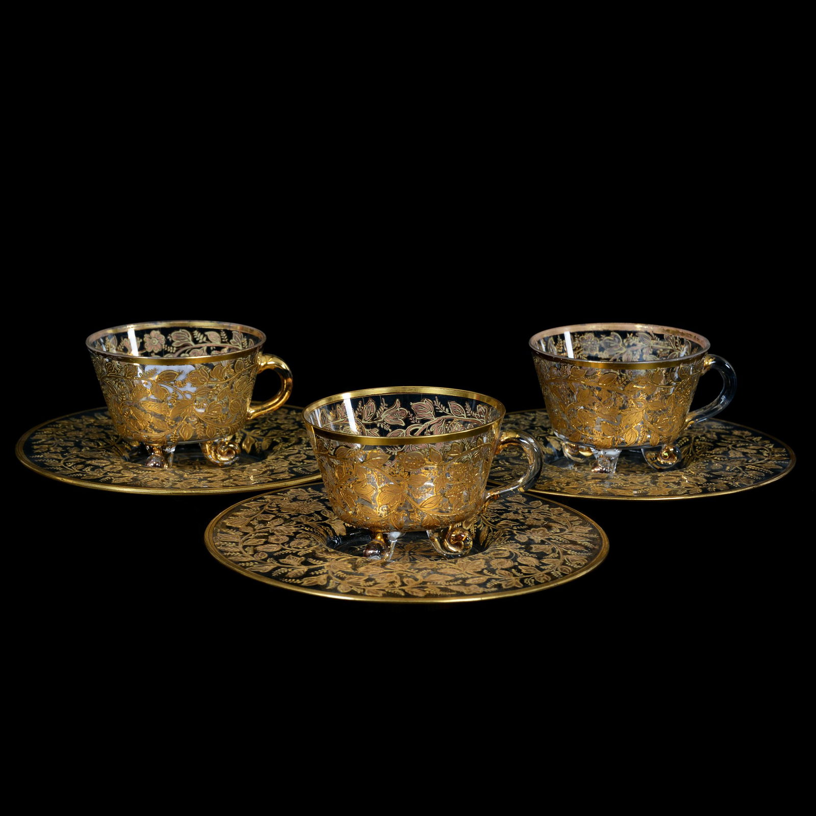 (3) Footed Cups/Saucers, Moser Art Glass: (3) Footed Cups/Saucers, Moser Art Glass, 2.75" x 6.5", Clear Crystal With Extensive Gold Enamel Vine And Blossom Decor, Gary Baldwin Collection