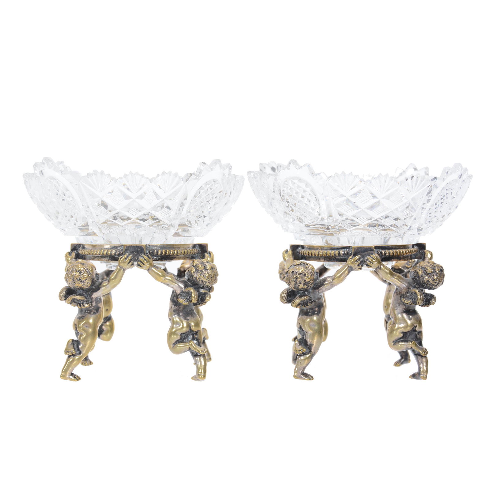 Pair Pairpoint Bowls On Figural Gilt Metal Stands: Pair Pairpoint Bowls On Figural Gilt Metal Stands, 4.75" X 5", Each Stand Features Four Cherubs Holding Cut Glass Bowl Above Head, No Visible Markings But Undoubtably Pairpoint, The Cut Glass Bowls Ha