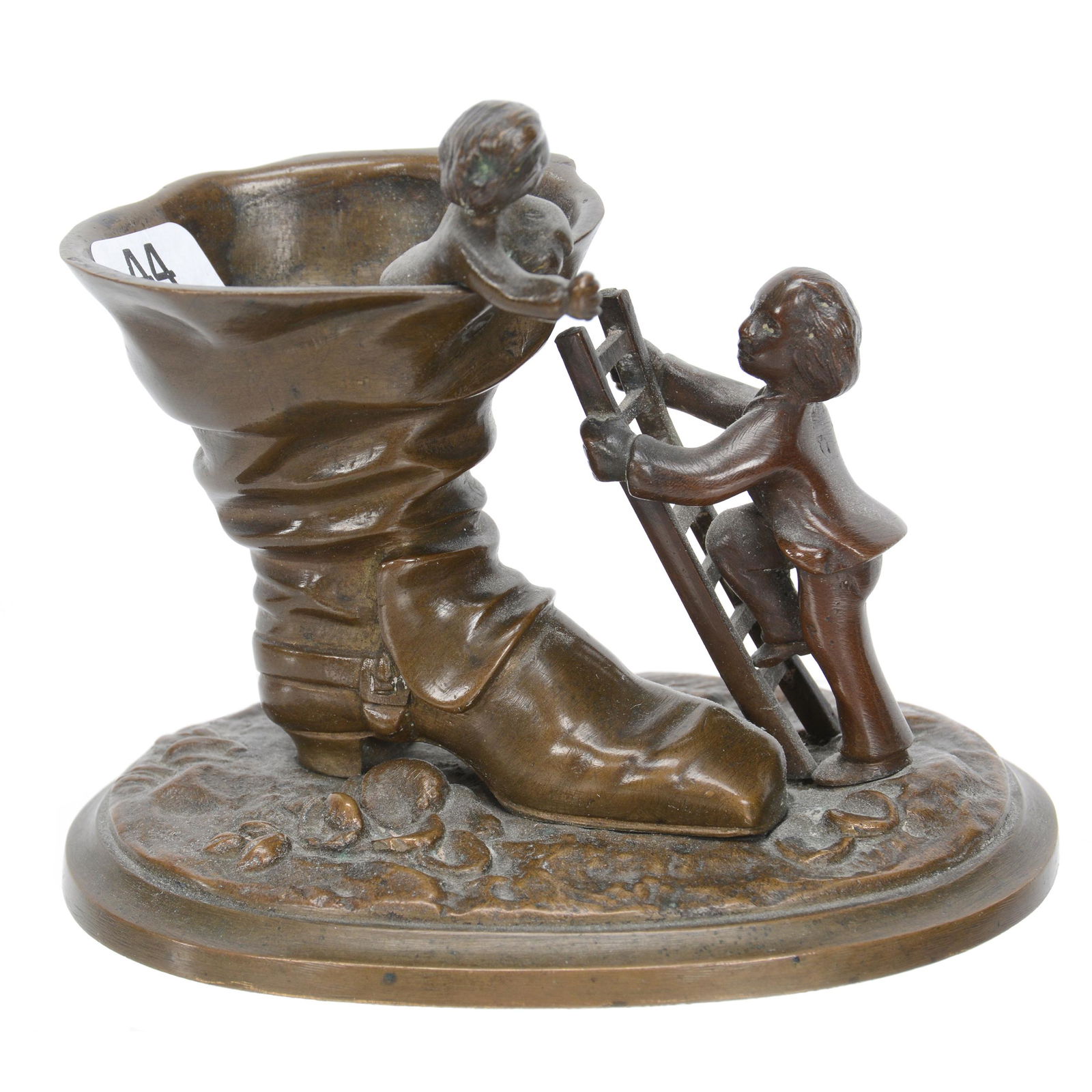 Bronze Novelty Figural Toothpick Holder: Bronze Novelty Figural Toothpick Holder, 4" X 4.75", Character Climbing Ladder To Reach Child Inside Boot, No Maker's Marks Visible, Collection Of Sylvia And The Late Nolan Jackson