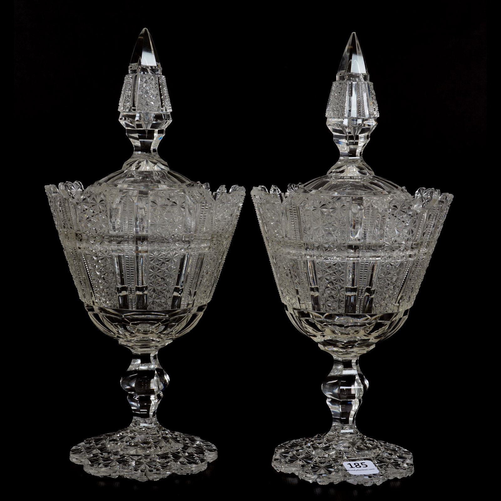 Pair Pedestal Candy Jars, BPCG: Pair Pedestal Candy Jars, BPCG, 12" X 5.5", Star Cut Panels Alternating With Clear And Zipper Cut Panels, Elaborate Scalloped Rim, Pattern Cut Lid And Scalloped Foot, Surface Chip Repair, Mike and Ani