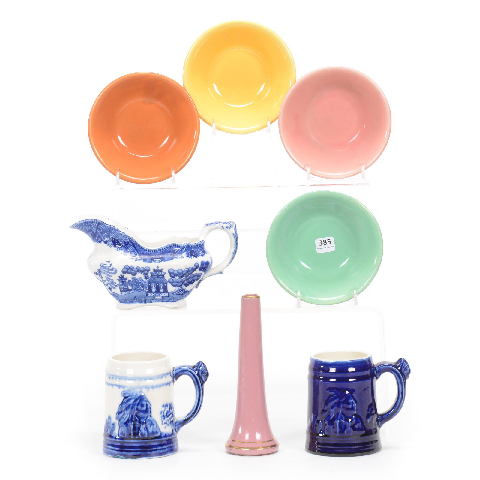 (8) Assorted Pottery Items: (8) Assorted Pottery Items, (2) 4.5" Reproduction Sleepy Eye Mugs, One With Base Chip Repair, (1) 7" Bud Vase, Pink Tones, Unidentified Mark, (4) 5.25" Marked Bauer Berry Dishes, Four Different Colors