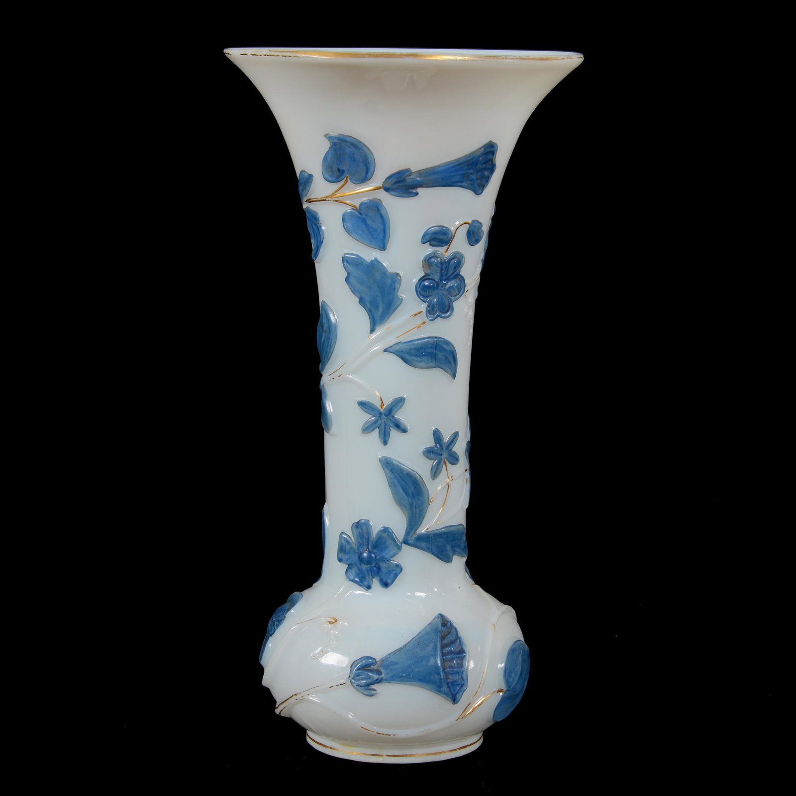 Vase, Unmarked Baccarat Art Glass: Vase, Unmarked Baccarat Art Glass, 9.75” x 5", White Opaline With Embossed Floral Design And Blue Floral Highlights, Interior Finish Flaw From Factory, John Lolley Estate. Mr. Lolley Regularly Marke