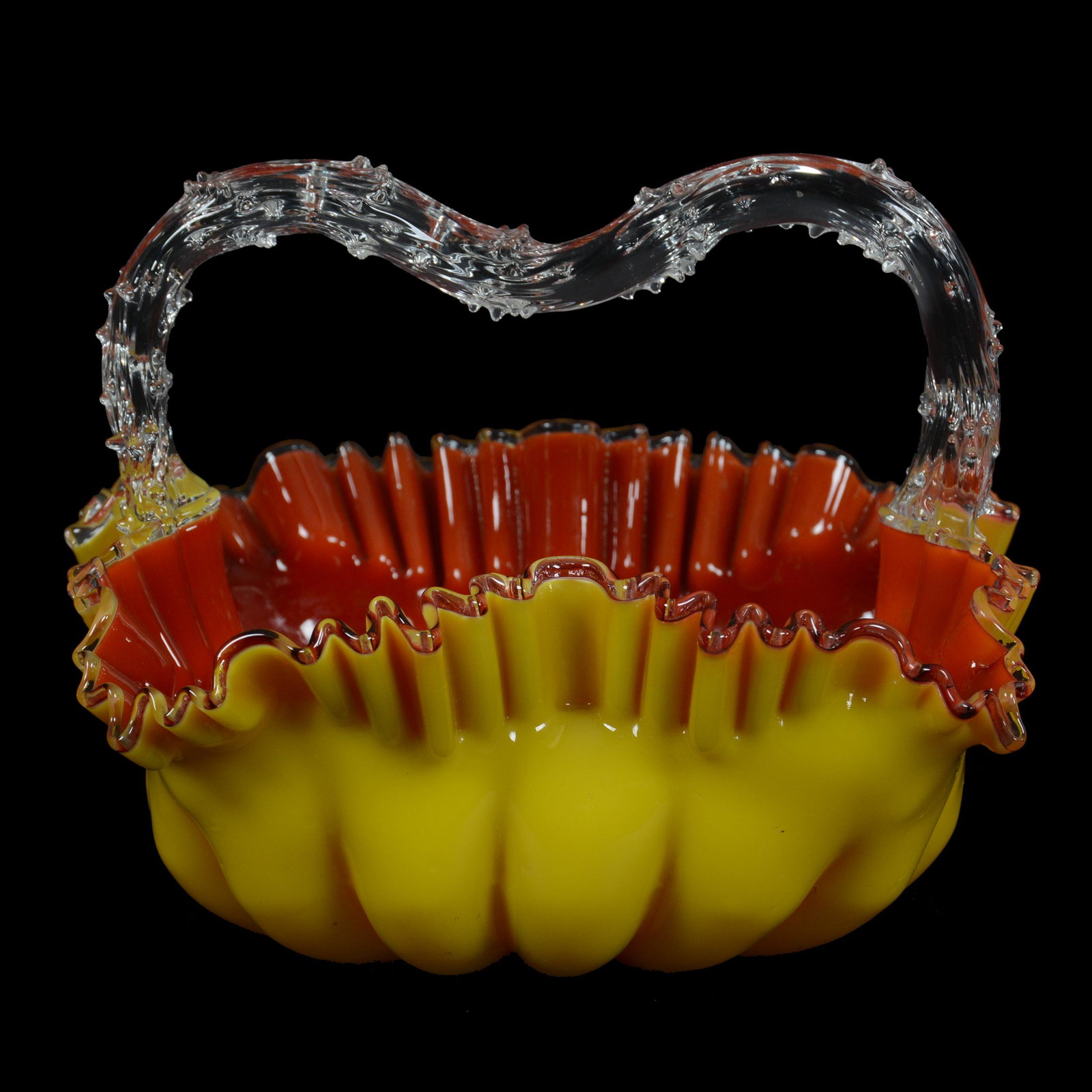 Basket, Cased Art Glass: Basket, Cased Art Glass, 5.25” x 6.5", Yellow Exterior, Orange Interior, Clear Applied Thorn Handle, Melon Ribbed, John Lolley Estate. Mr. Lolley Regularly Marked Items In His Collection With A Muse