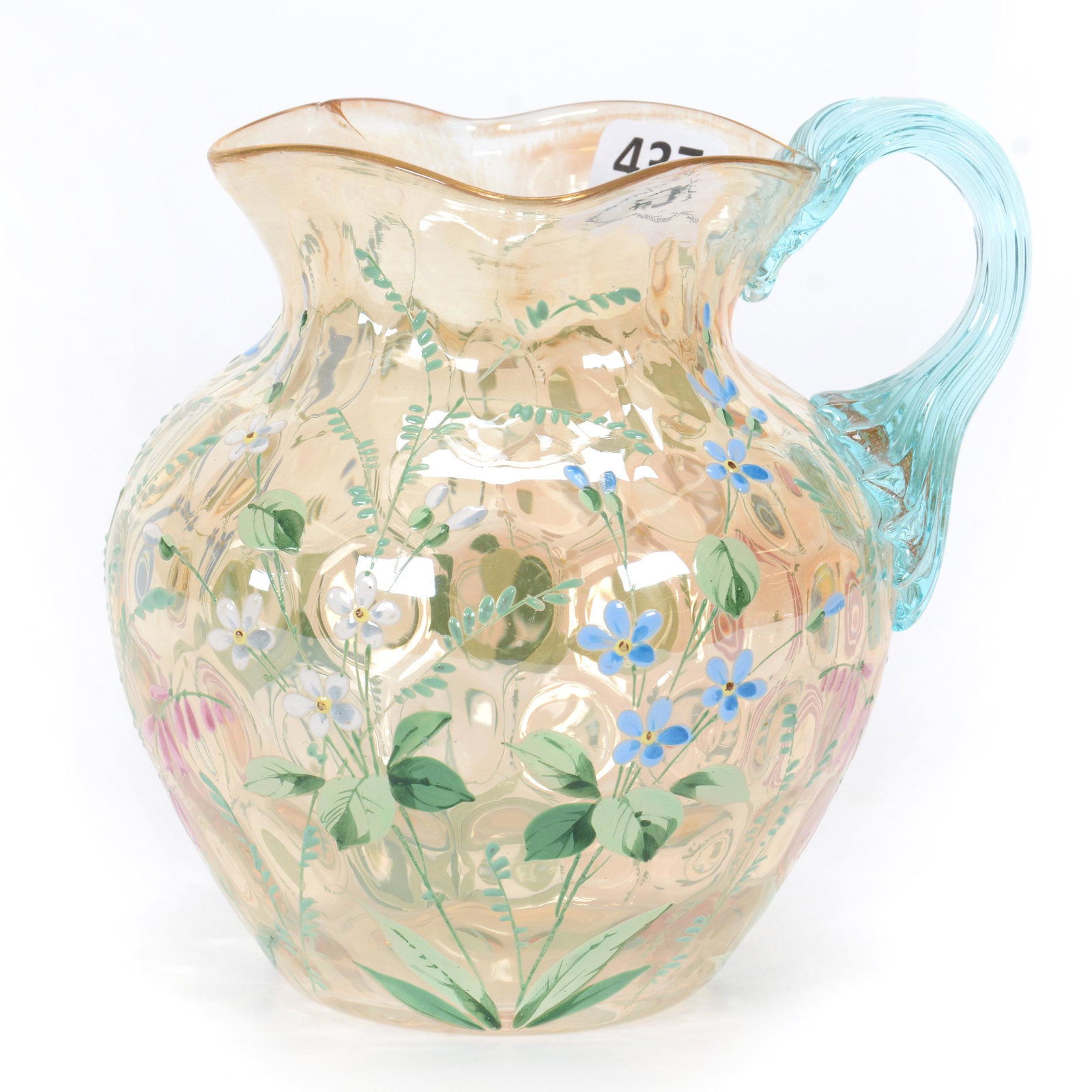 Pitcher, Iridescent Marigold Coinspot Art Glass: Pitcher, Iridescent Marigold Coinspot Art Glass, 4.75” x 4.5", Applied Blue Ribbed Handle, Colorful Enamel Floral Decor, Polished Pontil Base, Fan Shaped Interior Rim Chip, John Lolley Estate. Mr. L