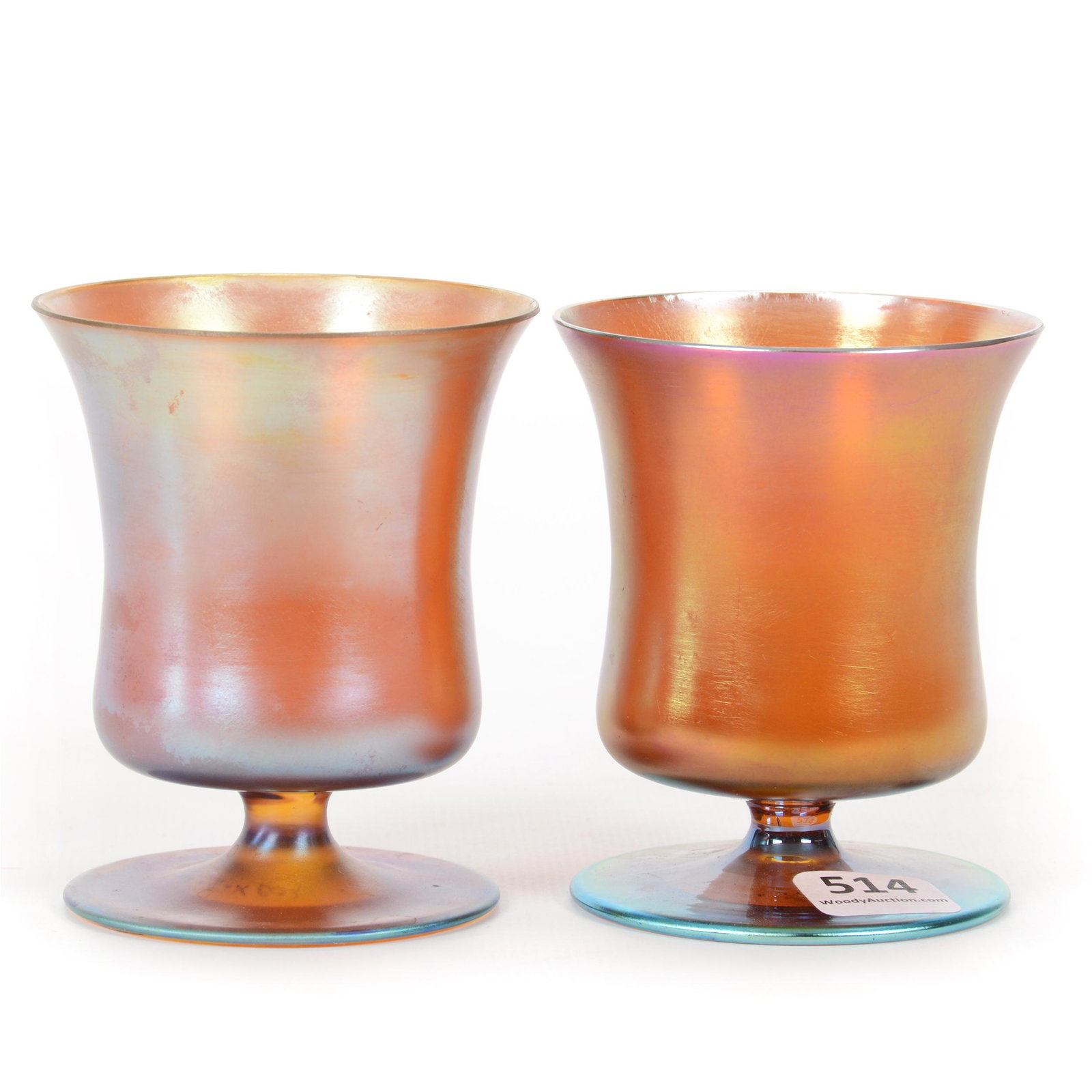 (2) Pedestal Vases, Unmarked WMF Art Glass: (2) Pedestal Vases, Unmarked WMF Art Glass, 3.5” x 2.75", Gold Iridescent, One Vase Does Have Original WMF Paper Label, John Lolley Estate. Mr. Lolley Regularly Marked Items In His Collection With A