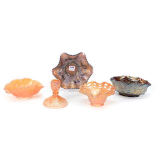 (5) Carnival Glass Items, Assorted: (5) Carnival Glass Items, Assorted, Assortment Includes: (1) Wreathed Cherry Sauce Dish, Purple, (1) 6" Strawberry Ruffled Dish, Basketweave Exterior, Amethyst, (1) Soda Gold Candlestick, Marigold, (1