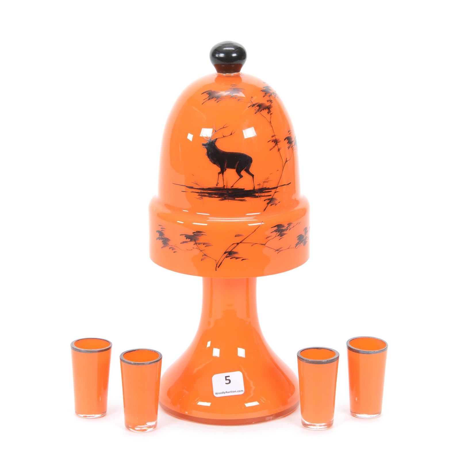 Decanter Set, Unmarked Czechoslovakia Art Glass: Decanter Set, Unmarked Czechoslovakia Art Glass, Cased Orange, (1) 9.5" Decanter With (4) 2" Whiskey Glasses, Sells With Acorn Shaped Lid With Black Silhouette Stag Scene Decor, Lid May Not Be Origina