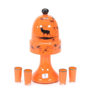 Decanter Set, Unmarked Czechoslovakia Art Glass: Decanter Set, Unmarked Czechoslovakia Art Glass, Cased Orange, (1) 9.5" Decanter With (4) 2" Whiskey Glasses, Sells With Acorn Shaped Lid With Black Silhouette Stag Scene Decor, Lid May Not Be