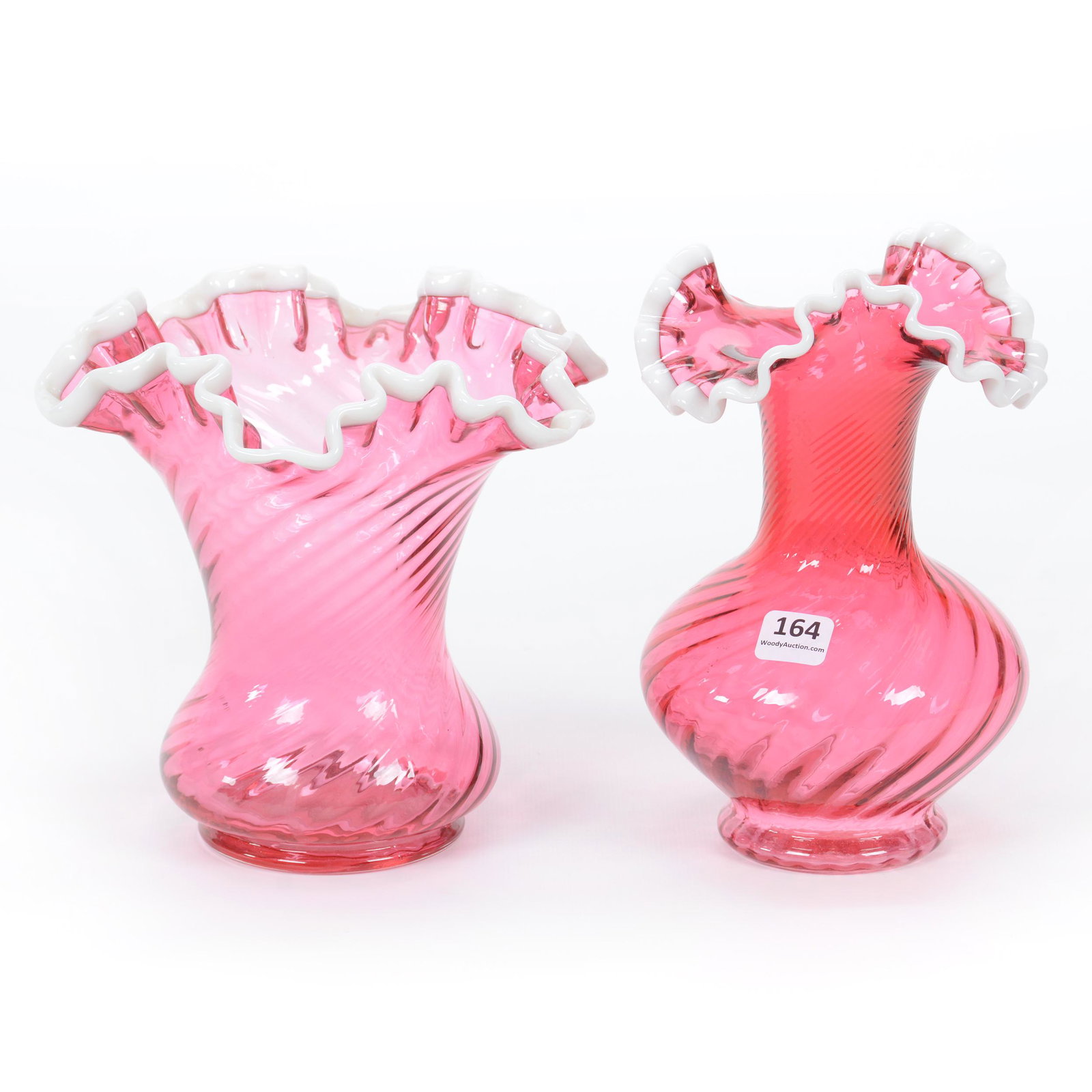 (2) Vases, Cranberry Art Glass By Fenton: (2) Vases, Cranberry Art Glass By Fenton, Applied White Ruffled Rims, Both With Swirl Design, (1) 7.75" X 4.75", (1) 6.75" X 7", Private Collection