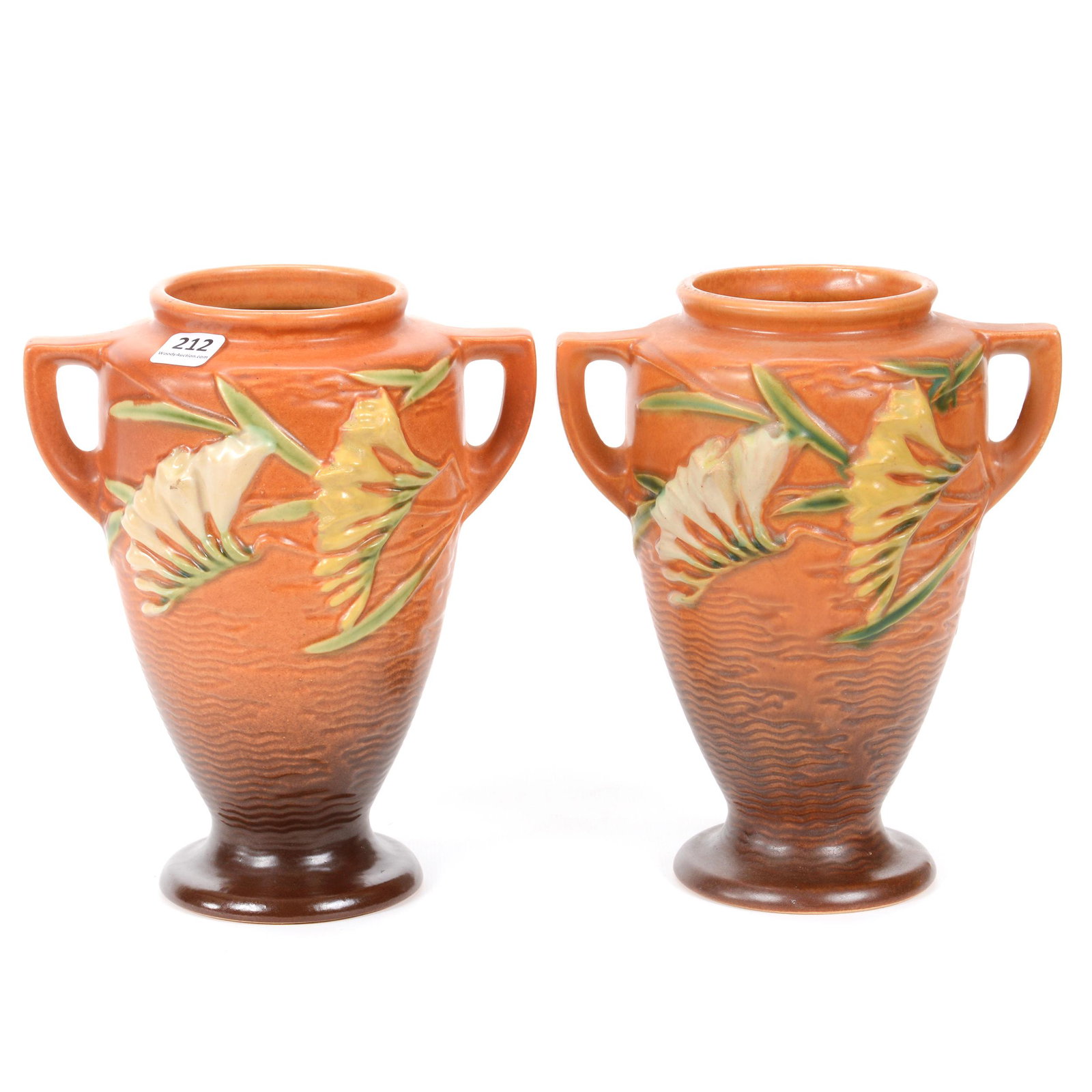 Pair Vases, Roseville Pottery #121-8", Freesia Pattern: Pair Vases, Roseville Pottery #121-8", Freesia Pattern, 8.25" x 6.75", Brown Tones, Two Handles - One Vase Has Professional Base Chip Repair, One Vase Has Small Glaze Chip On Flower, The David Risen C