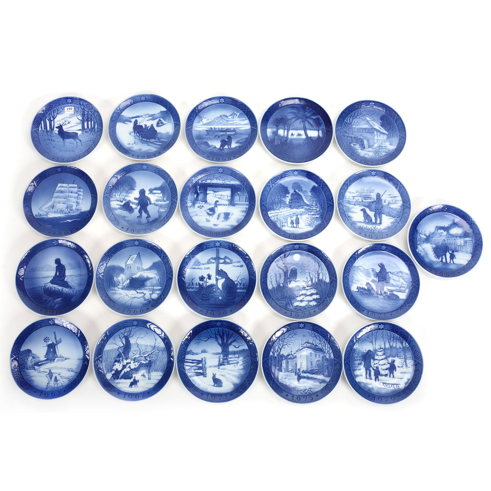 (21) Christmas Plates By Royal Copenhagen: (21) Christmas Plates By Royal Copenhagen, 7.25", Plates Dated From 1960 - 1980 Inclusive, 1960-The Stag, 1961-The Training Ship, 1962-The Little Mermaid At Wintertime, 1963-Windmill, 1964-Fetching Th