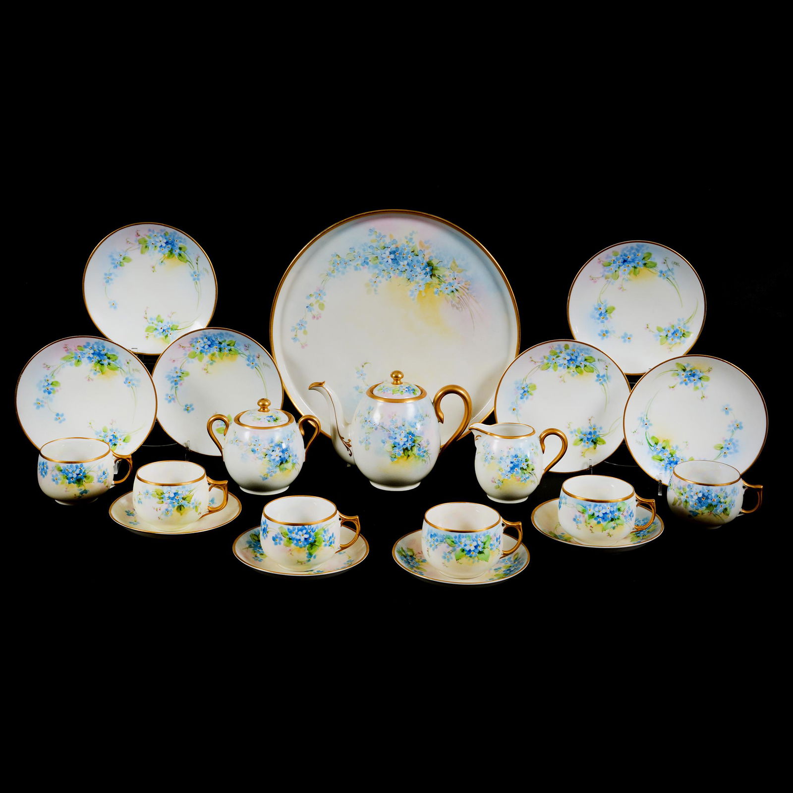 Tea Service, Koenig Mark, Twenty Piece Set: Tea Service, Koenig Mark, Twenty Piece Set, Forget-Me-Not Pattern, Set Includes (1) 5" X 7" Tea Pot, Matching Creamer And Sugar, (6) Matching 6" Dessert Plates, (6) Cups, (4) 5.25" Saucers, Artist Sig