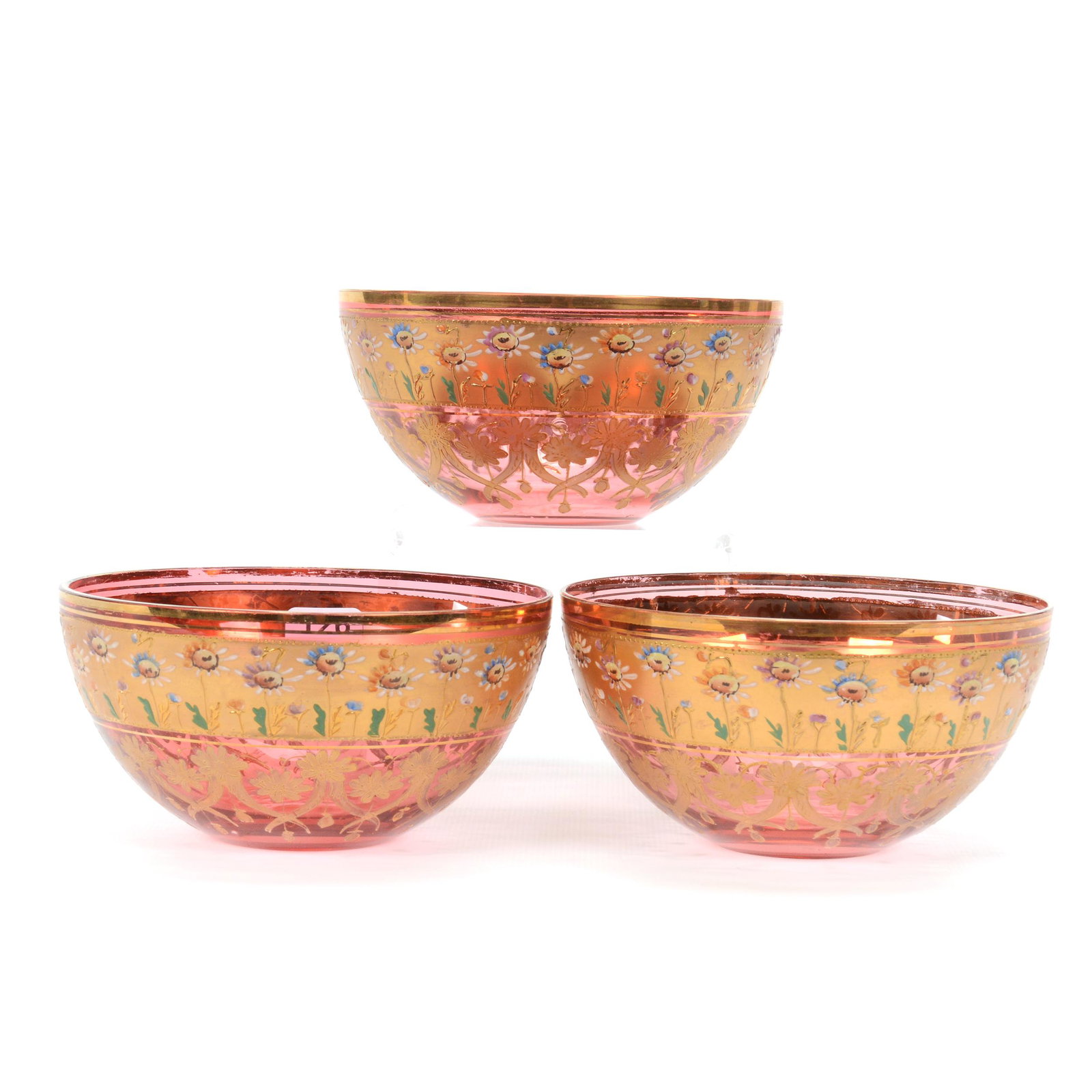 (3) Finger Bowls, Cranberry Art Glass, Decorated: (3) Finger Bowls, Cranberry Art Glass, Decorated, 2.75" x 5.25", Extensive Gold And Colorful Daisy Decor, Bohemian, Nice Quality, Don Henson Estate, Michigan. This auction begins the dispersal of a co