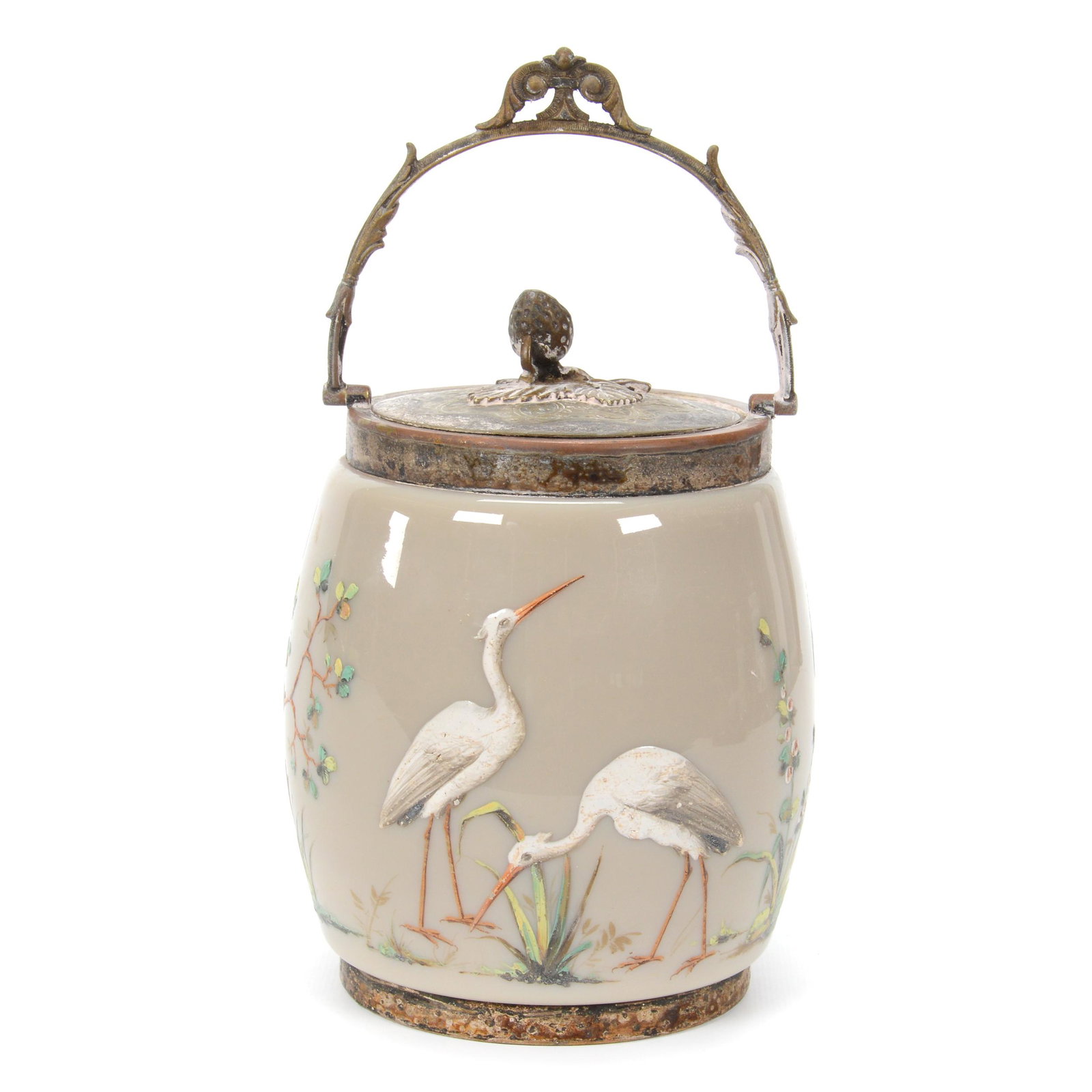 Biscuit Jar, Dark Cream Opaque Art Glass: Biscuit Jar, Dark Cream Opaque Art Glass, 7.25" x 5", Heavy Enamel Decor Of Stork And Trees, Silverplate Lid And Bail, Silver Has Some Tarnish, Don Henson Estate, Michigan. This auction begins the dis
