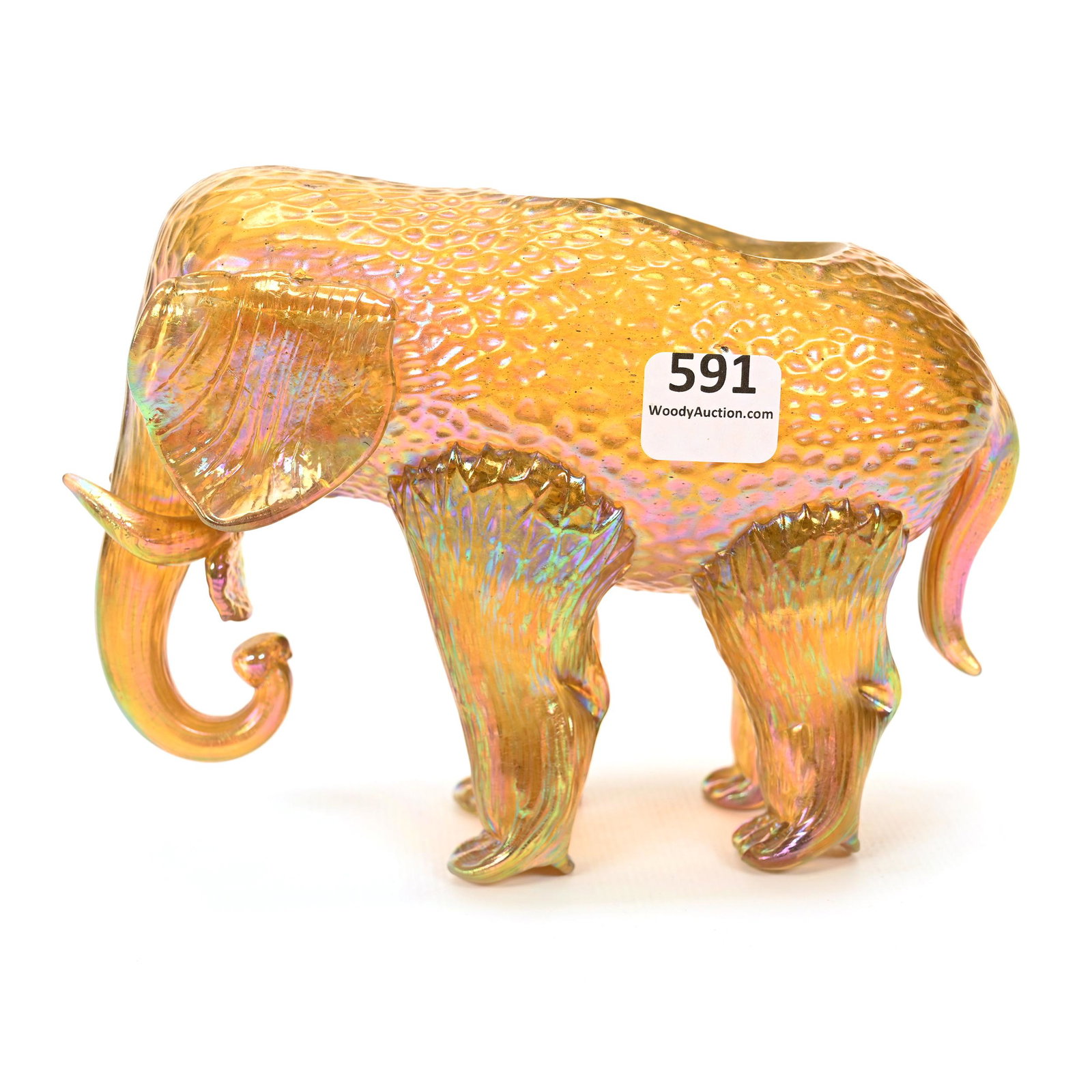 Figural Elephant Vase By Loetz Art Glass: Figural Elephant Vase By Loetz Art Glass, 4.75" x 6.25", Gold Iridescence, One Tusk Has Chip On End, Don Henson Estate, Michigan. Part 2. This Auction Is The Continuation Of The Dispersal Of A Collect