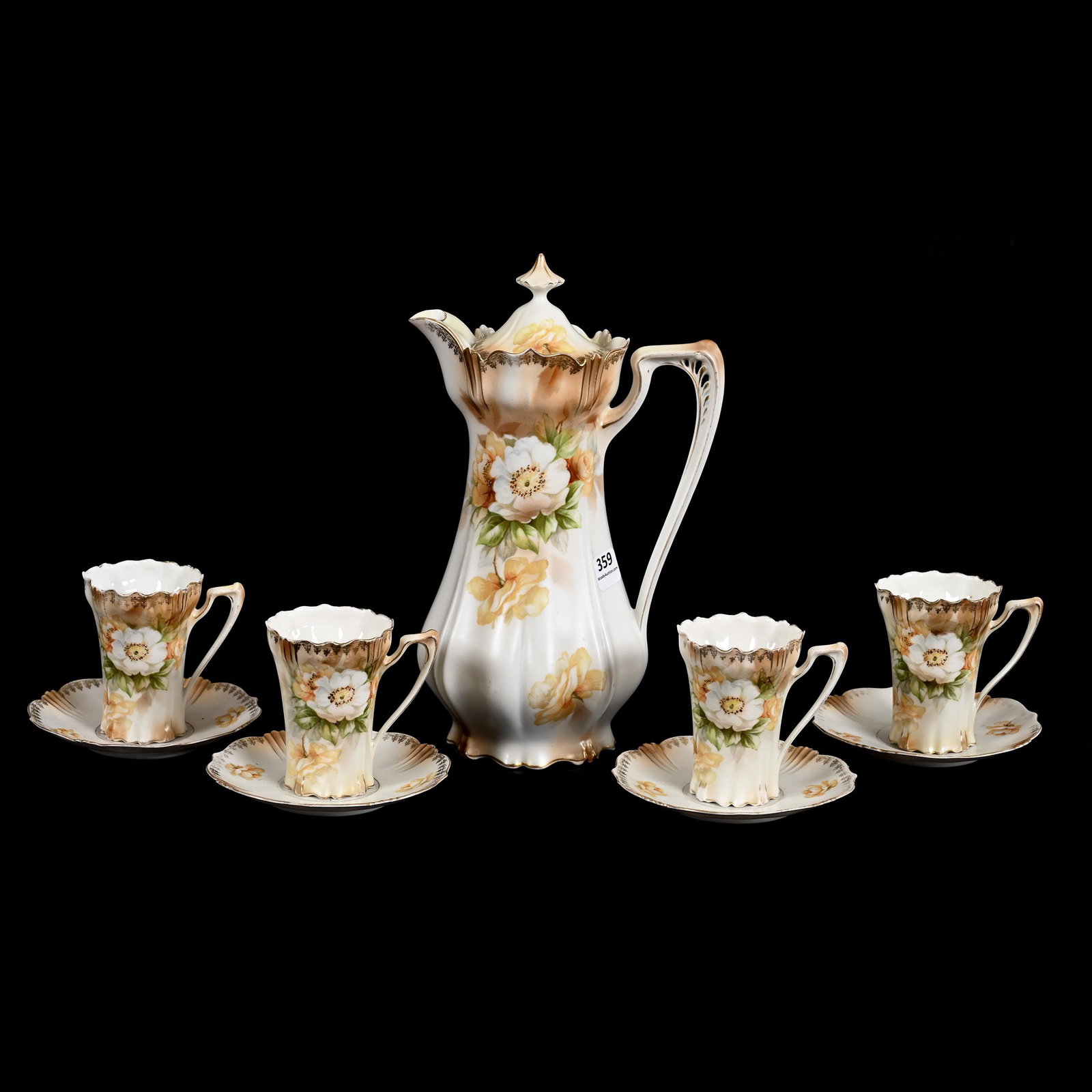 Chocolate Set Marked R.S. Prussia: Chocolate Set Marked R.S. Prussia, White And Brown Satin Finish, White And Yellow Floral Decor, (1) 10" X 6.25" Chocolate Pot, (4) Matching 3.5" X 4.75" Cups And Saucers, Inside Rim Chip On Pot, One C