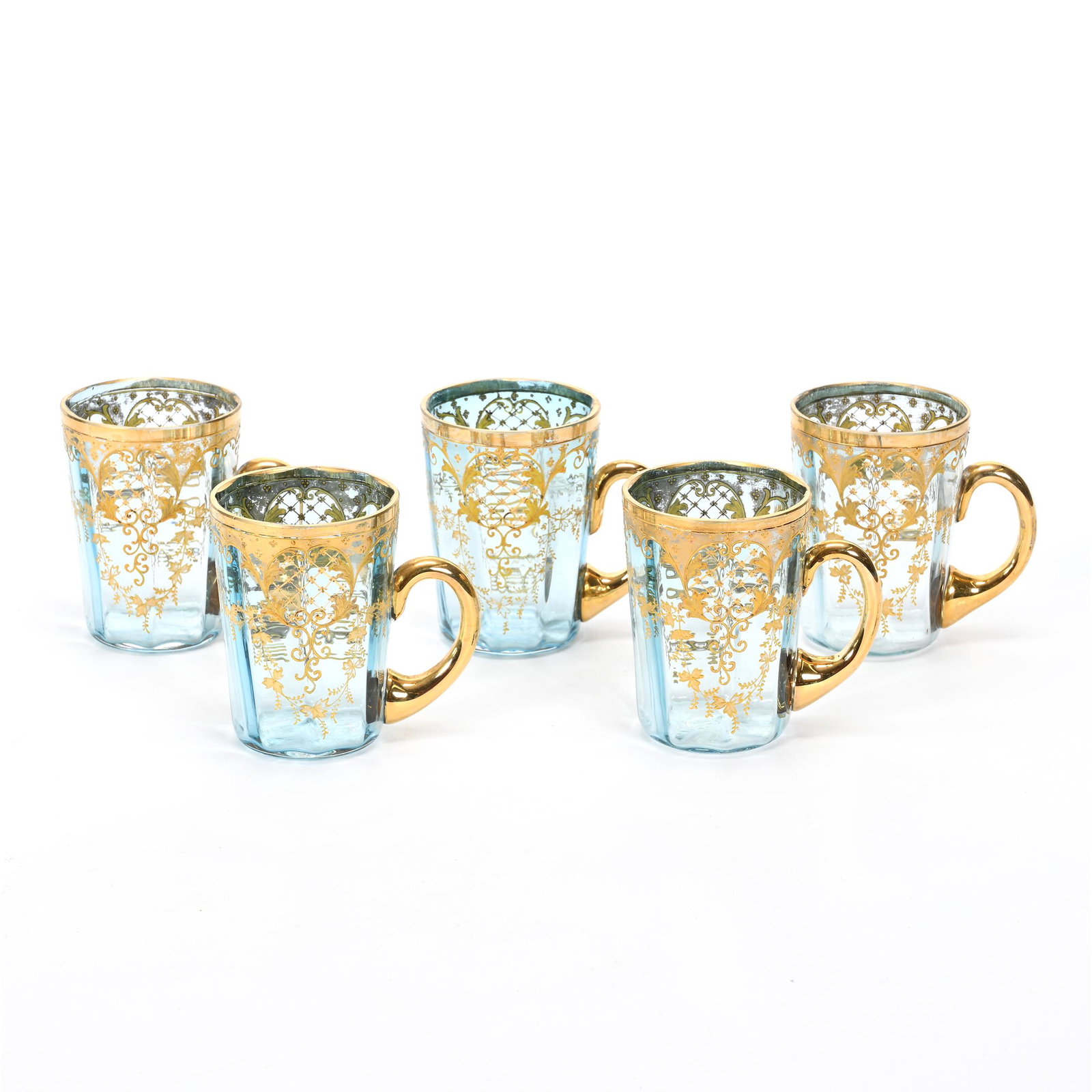(5) Mugs, Blue Bohemian Art Glass, Optic Rib: (5) Mugs, Blue Bohemian Art Glass, Optic Rib, 3.25" x 2.25", Heavy Gold Floral And Lattice Decor, Gold Handles, Don Henson Estate, Michigan. Part 3. This auction is the final dispersal of a collection